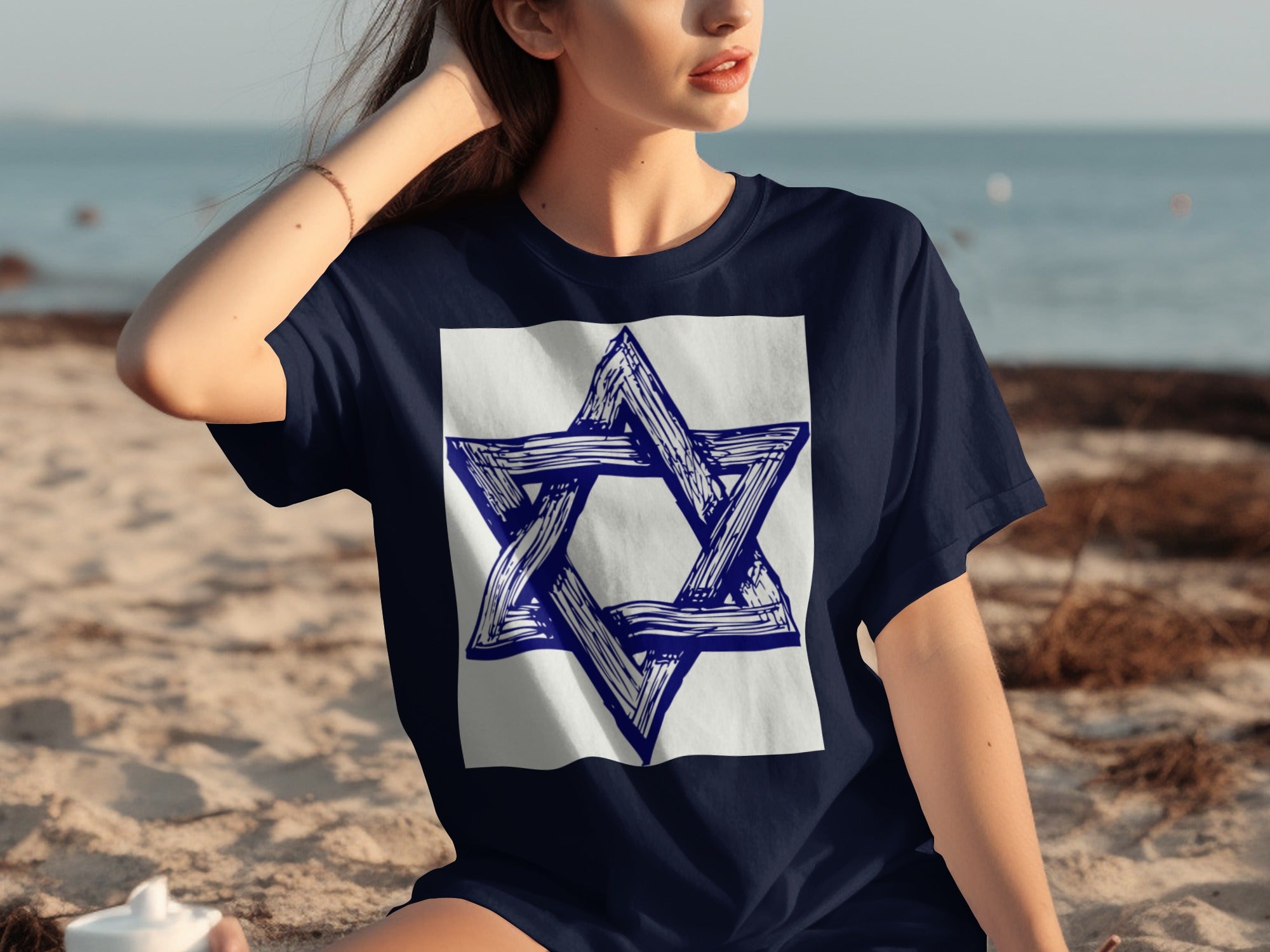 Navy t-shirt with a hand-drawn Star of David graphic on a white square.