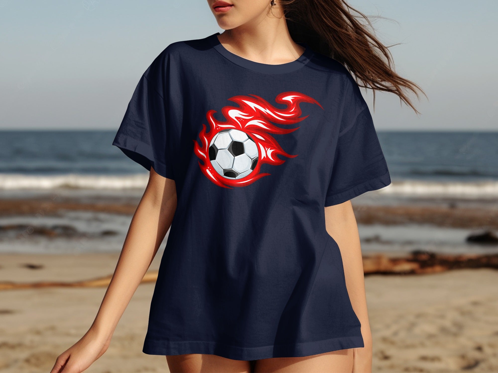 Dark blue t-shirt with a soccer ball surrounded by red flames graphic.