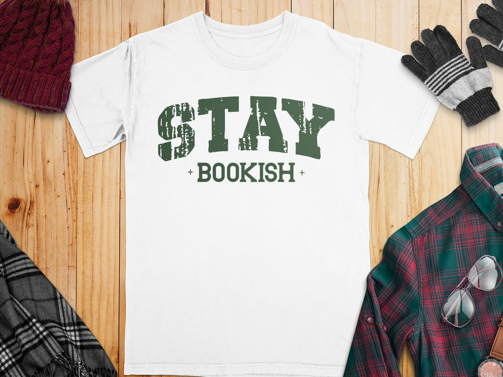 White t-shirt with distressed green text "STAY BOOKISH" in the center.