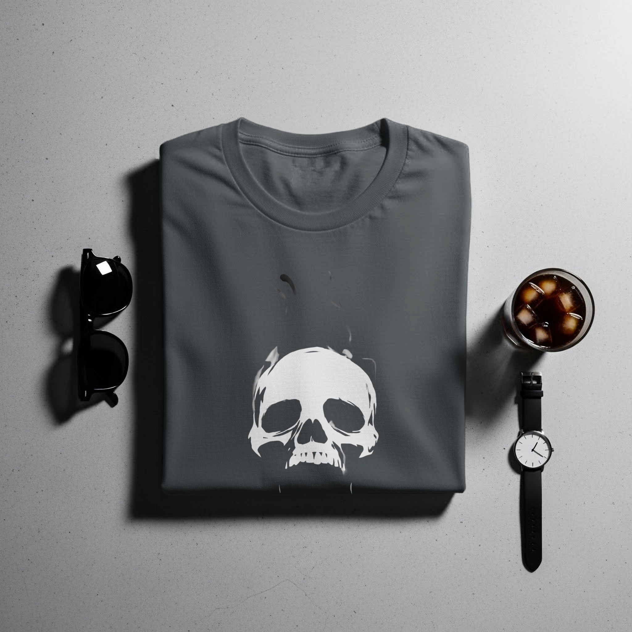 Dark grey t-shirt with a white skull graphic, sunglasses, and a drink.