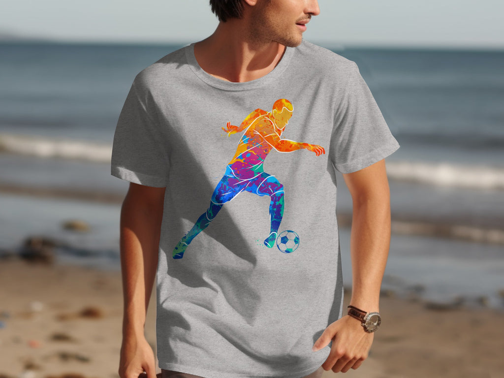 Grey t-shirt with colorful abstract soccer player graphic on front.