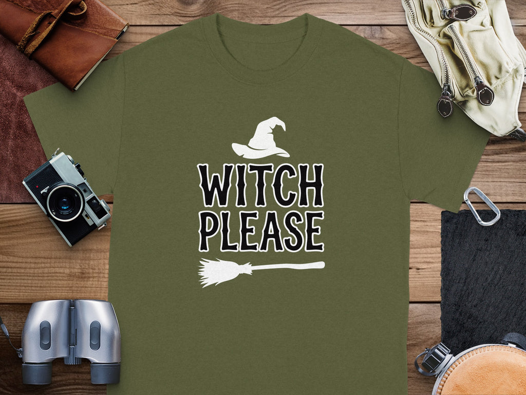 Olive green t-shirt with white witch hat, "WITCH PLEASE," and broom graphic.