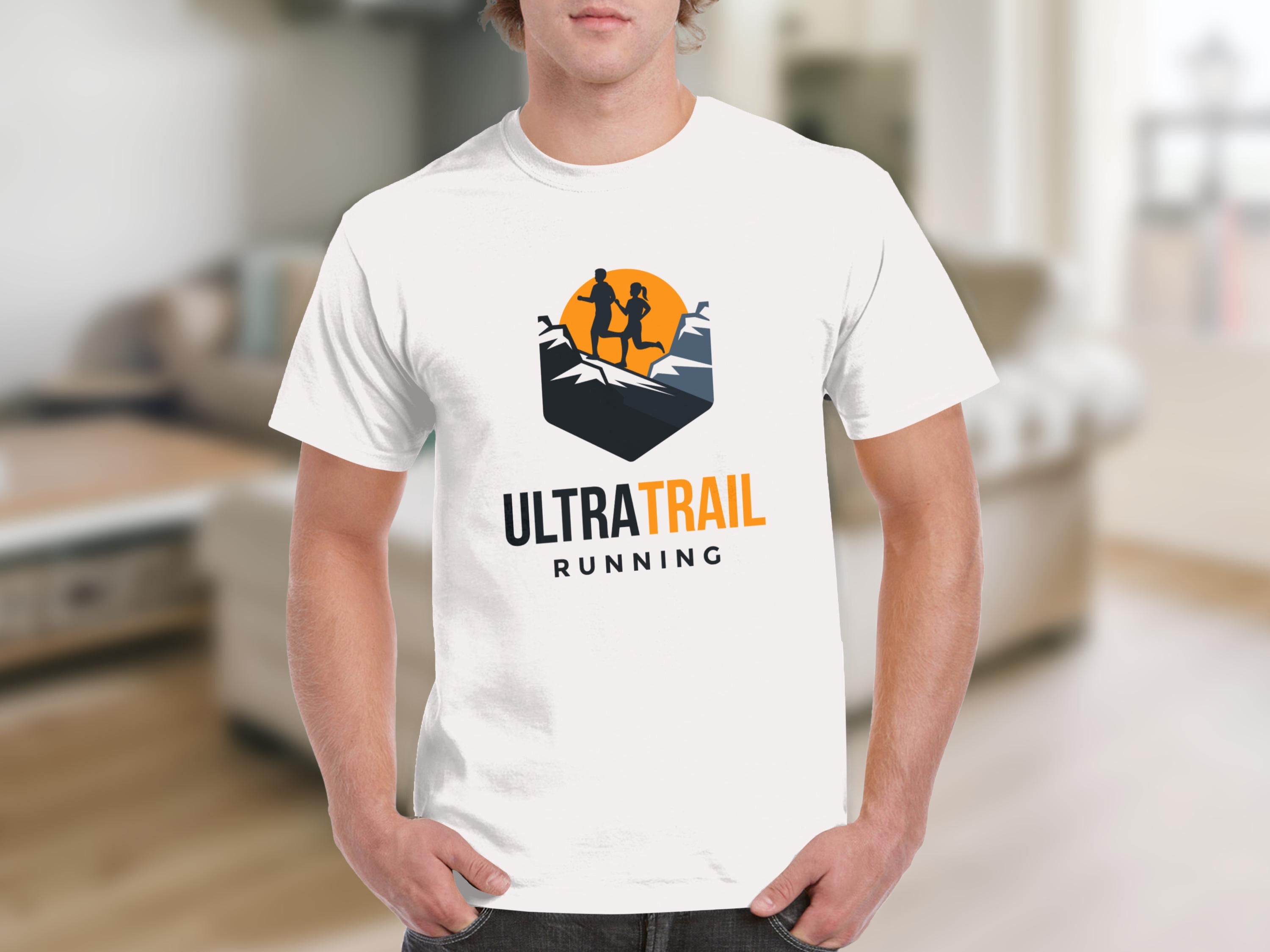 White t-shirt with Ultra Trail Running logo featuring runners on mountains.