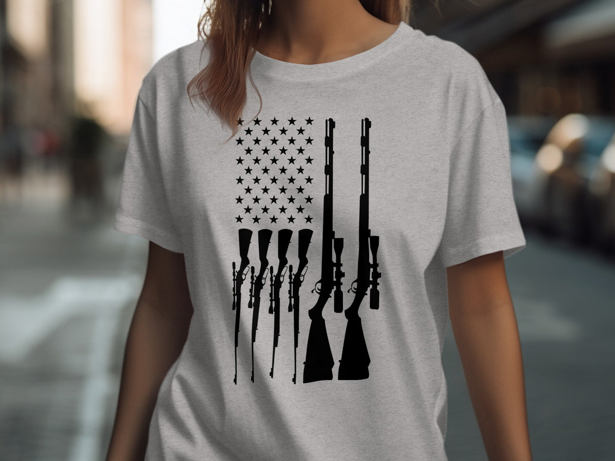 Grey t-shirt with black silhouettes of rifles forming an American flag.