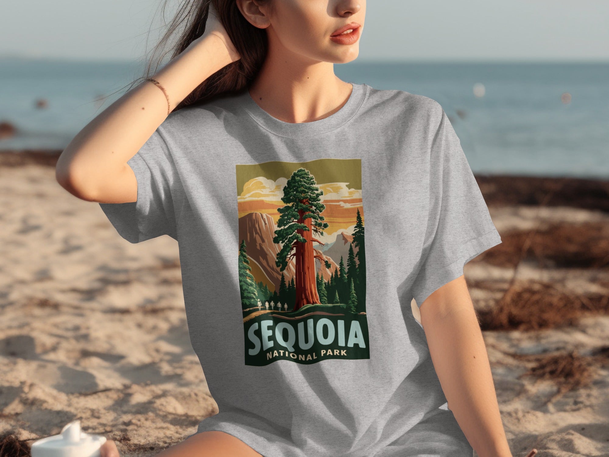 T-shirt featuring a Sequoia National Park illustration with a giant tree and mountains.