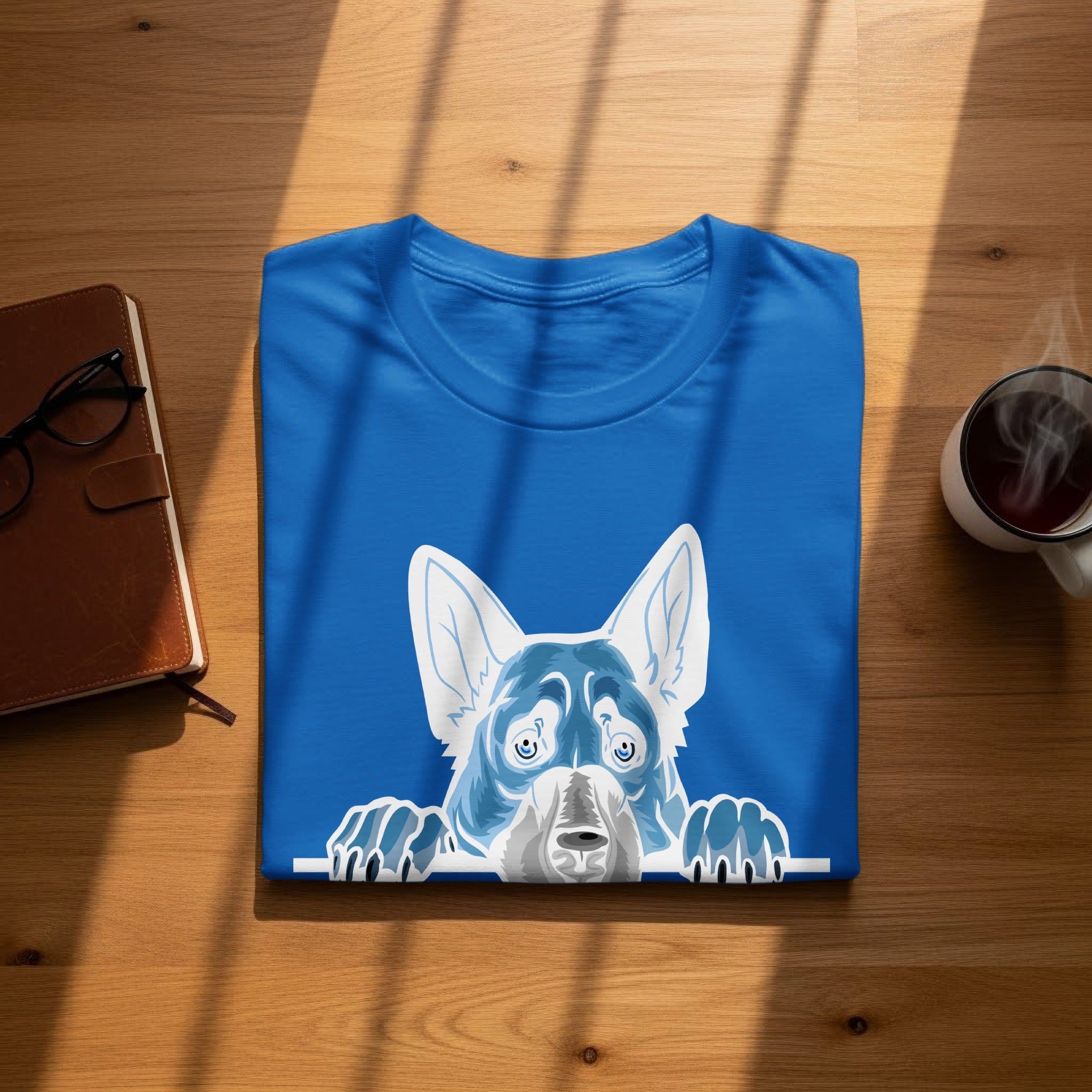 Blue t-shirt with a blue and white peeking dog illustration.