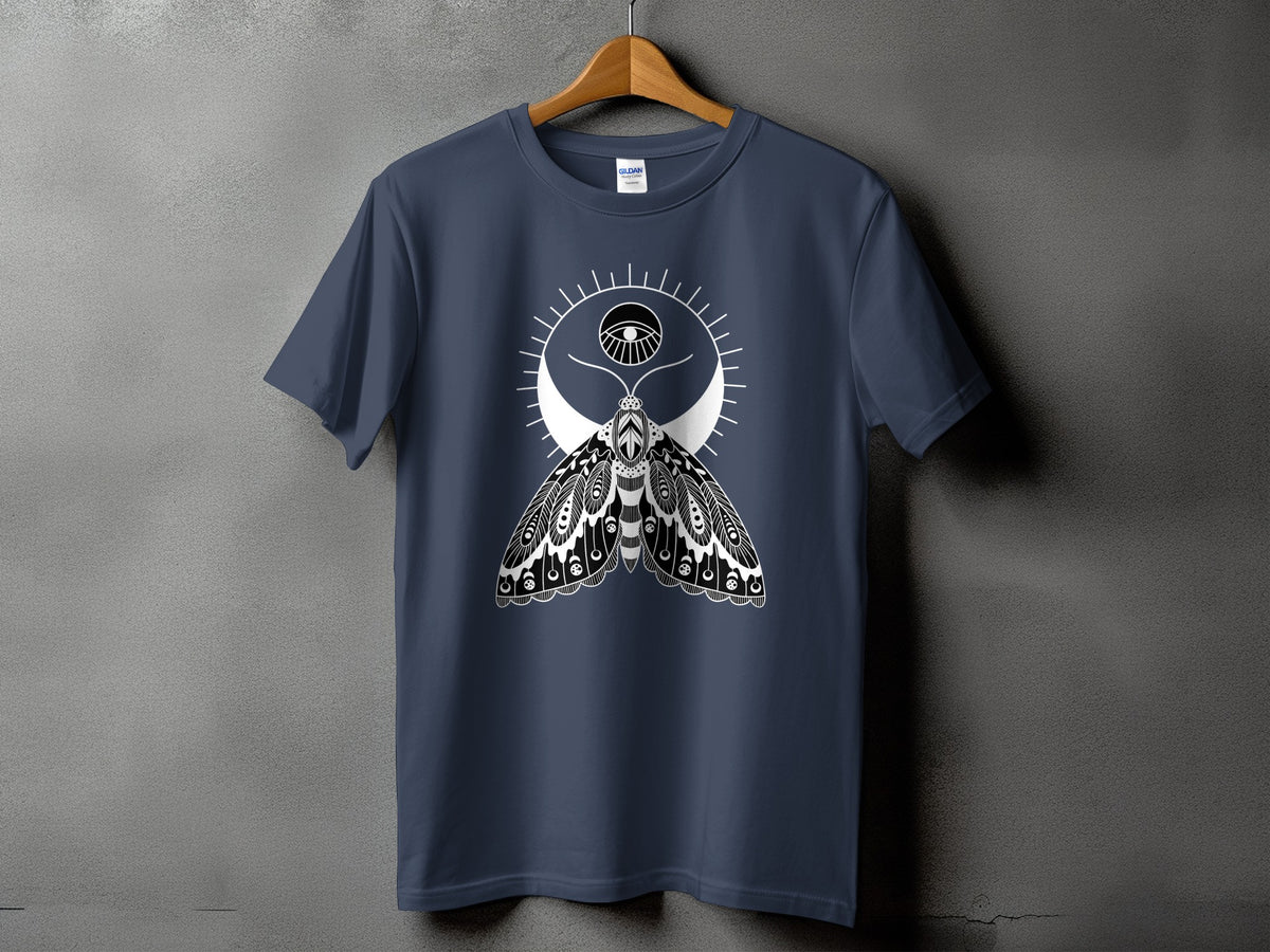 Dark blue t-shirt with a black and white moth and eye design.