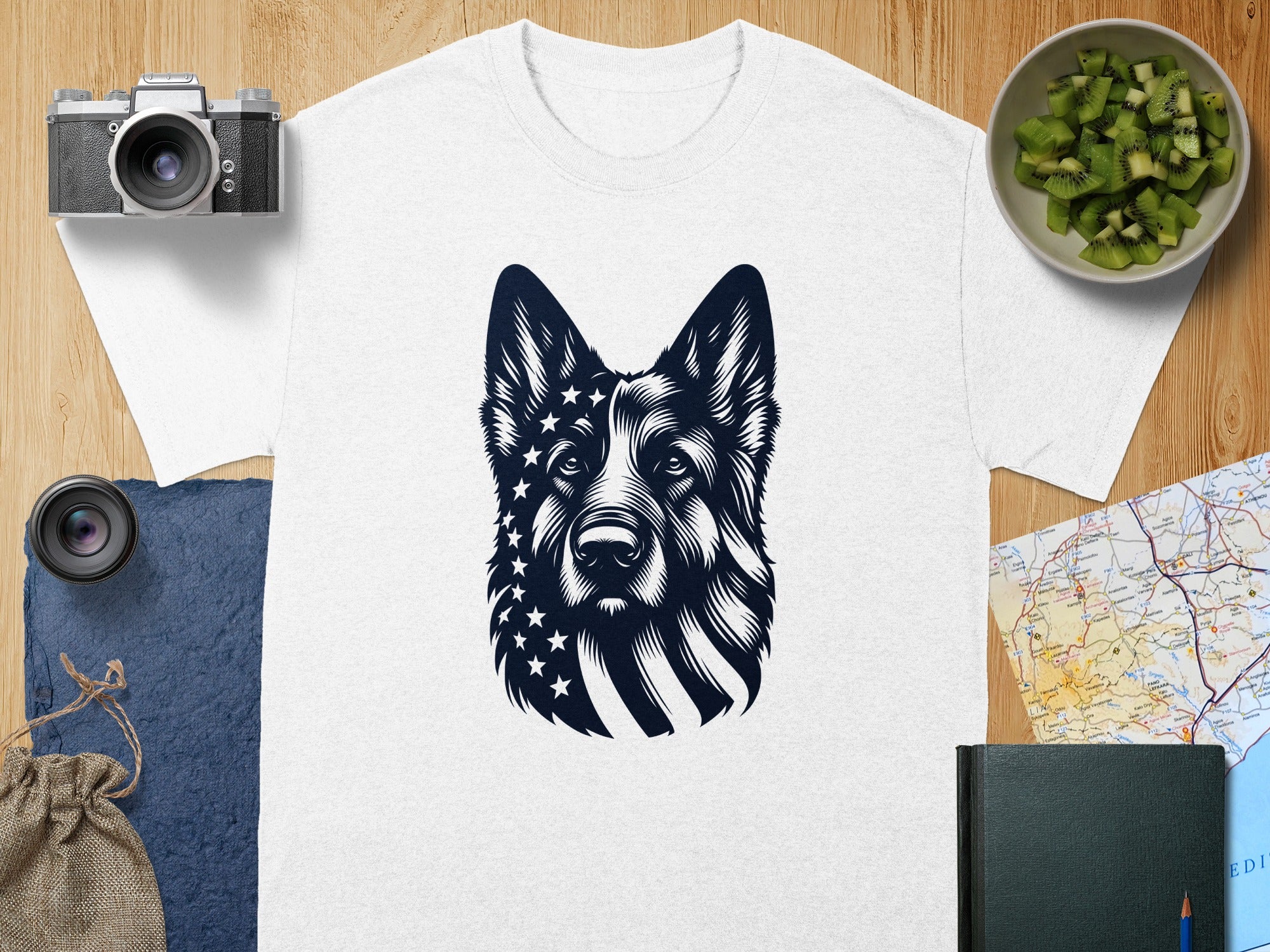White t-shirt graphic of German Shepherd with American flag design on face.