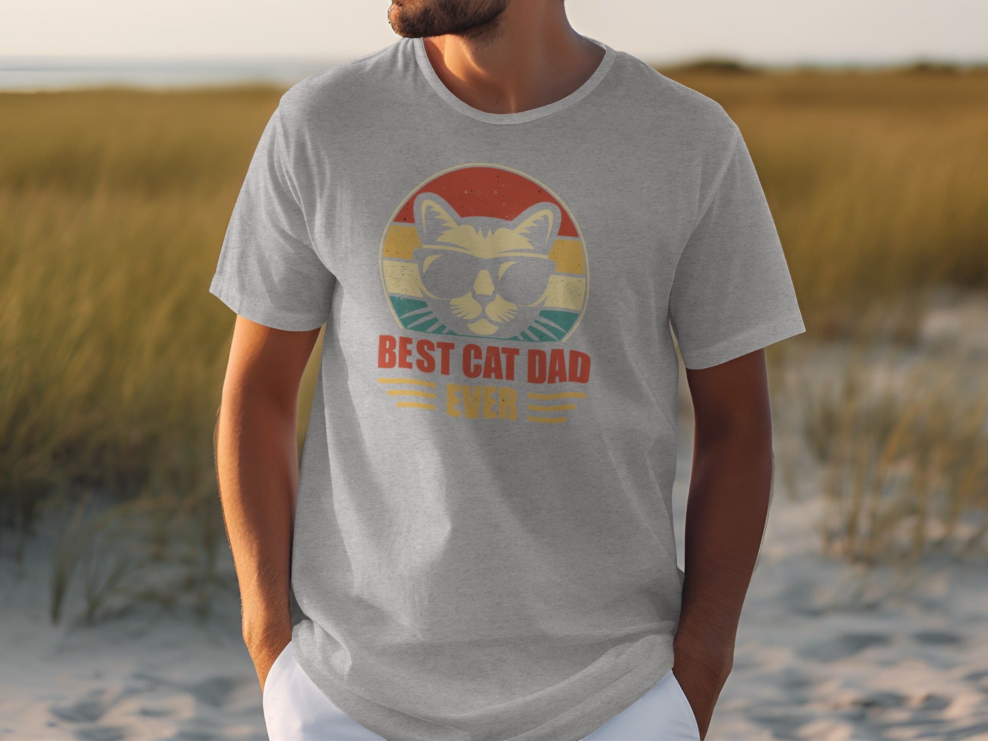 Grey t-shirt with sunglasses-wearing cat graphic and "BEST CAT DAD EVER" text.