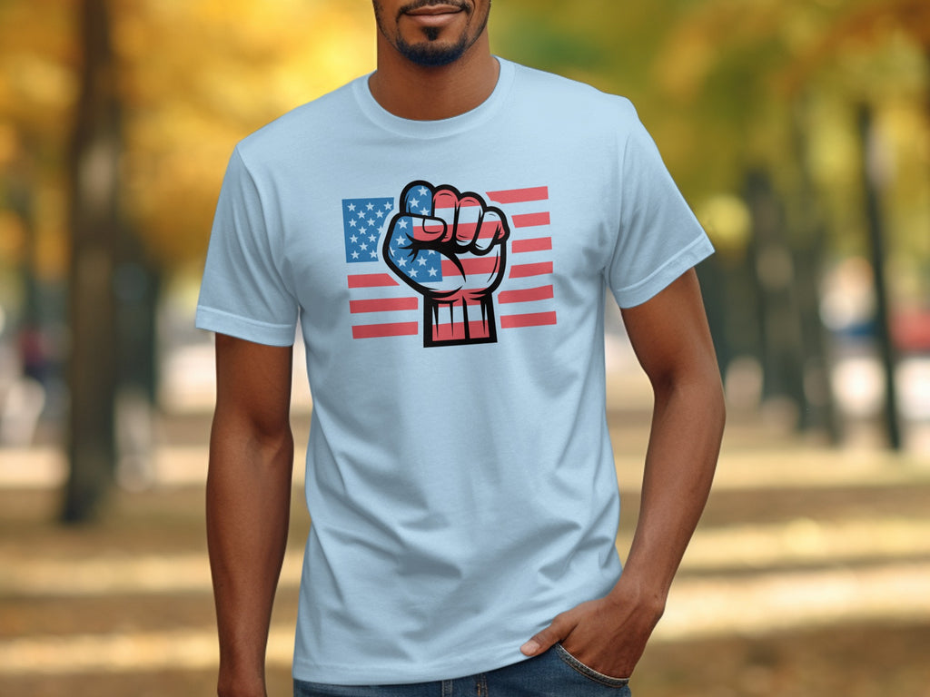 Light blue t-shirt with a graphic of a fist against US flag stripes and stars.