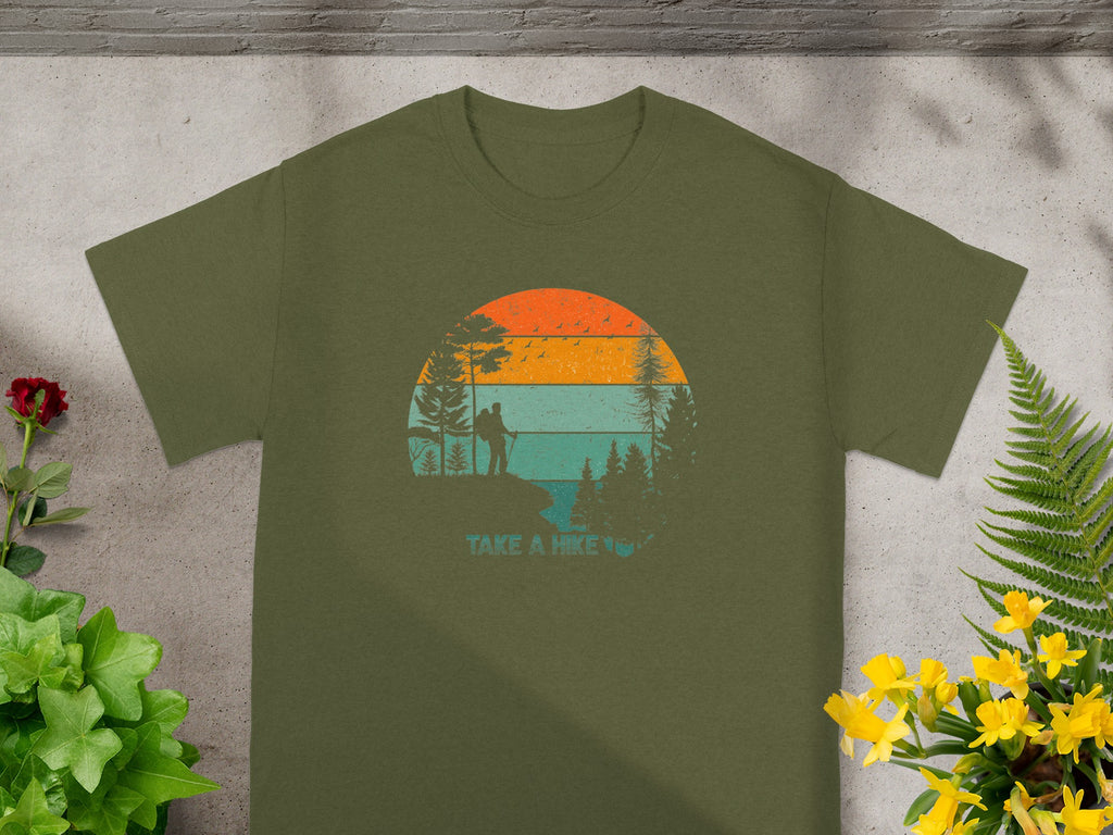 Olive green t-shirt with "Take a Hike" graphic of hikers at sunset.
