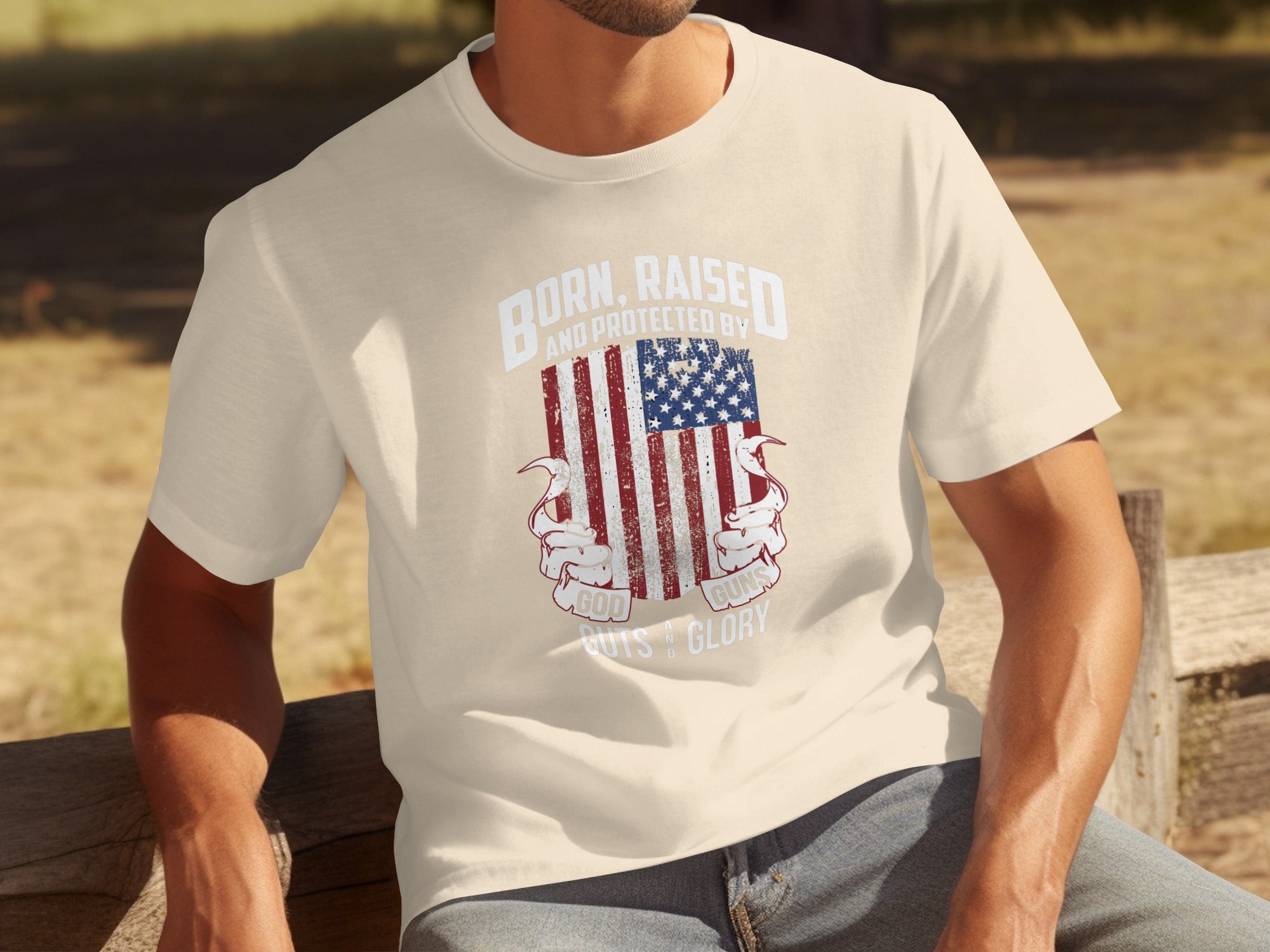 Cream t-shirt with distressed US flag graphic and text.