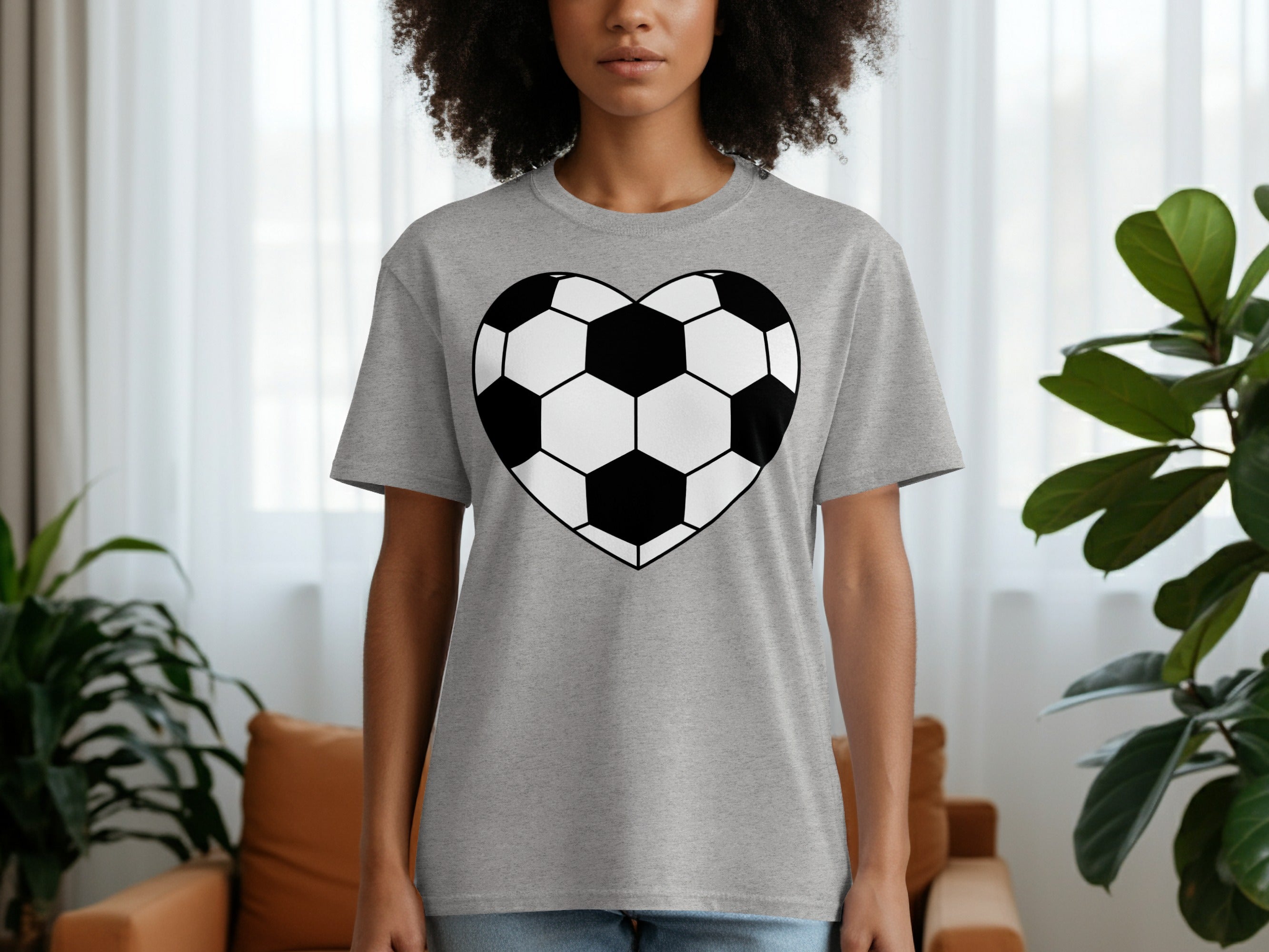 Grey t-shirt with a black and white heart-shaped soccer ball graphic.