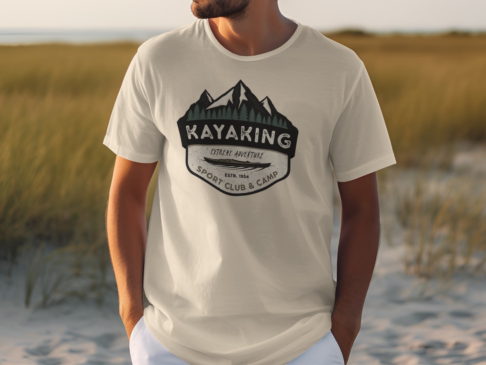 Cream t-shirt with "Kayaking Extreme Adventure Sport Club & Camp" graphic.
