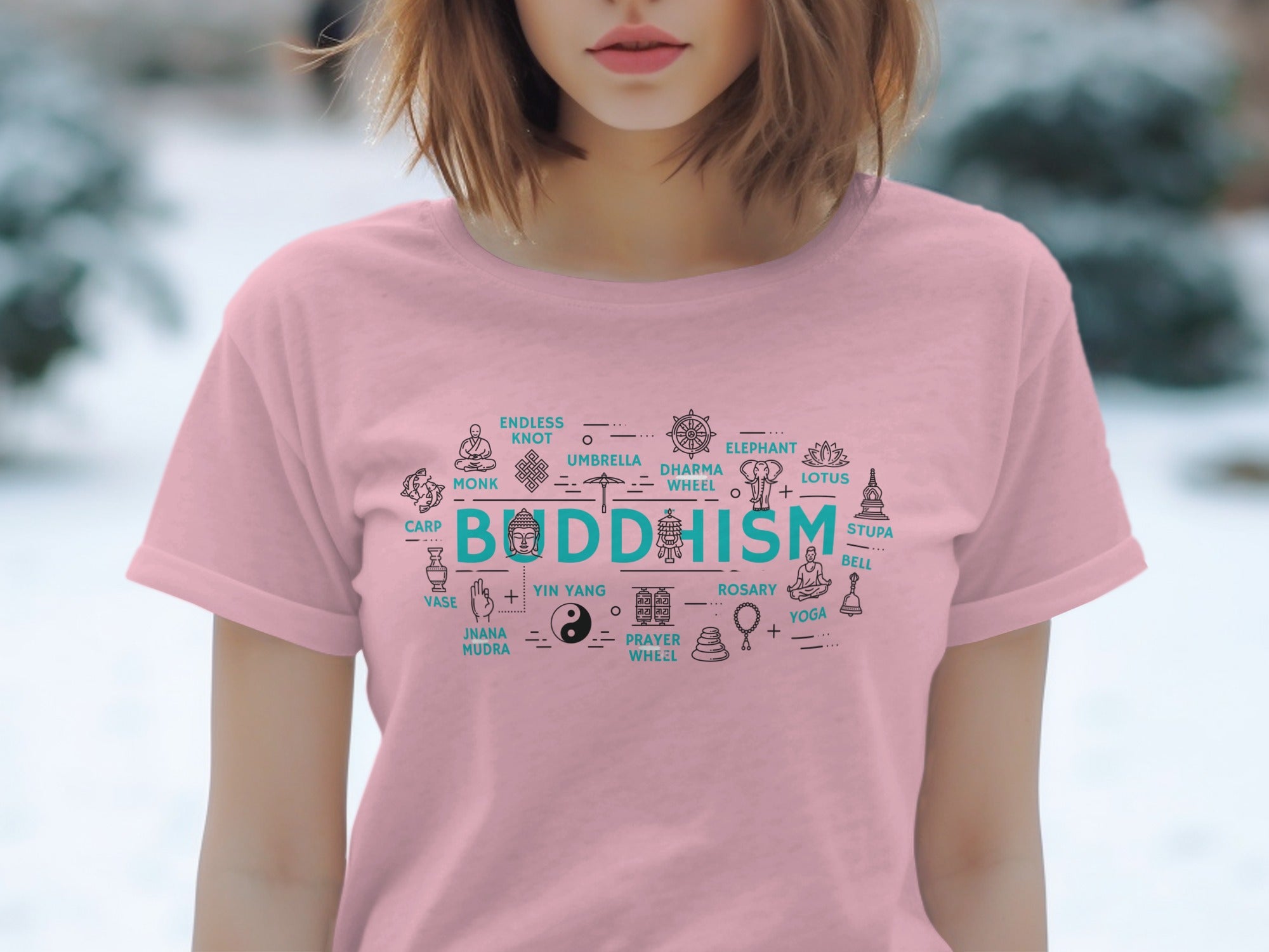 Pink t-shirt with "Buddhism" text and associated icons such as monk, lotus, and yin yang.