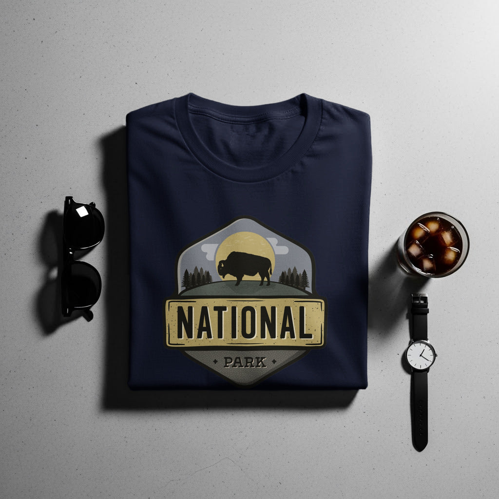 Navy t-shirt graphic with bison, trees, and text: National Park.