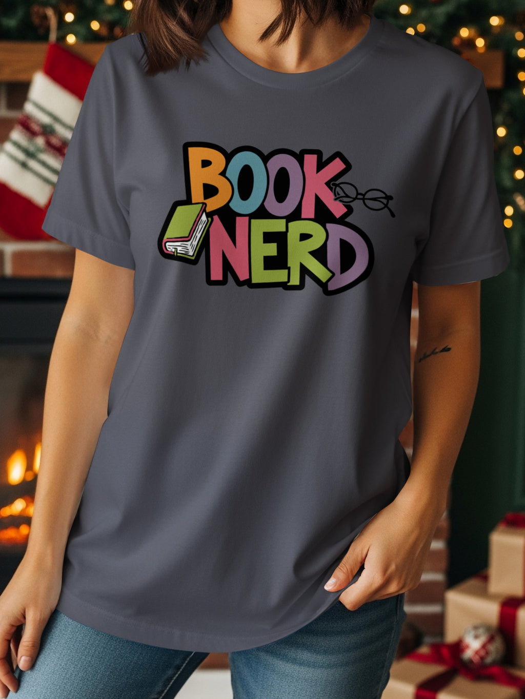 Gray t-shirt with colorful "BOOK NERD" text, a book, and glasses graphic.