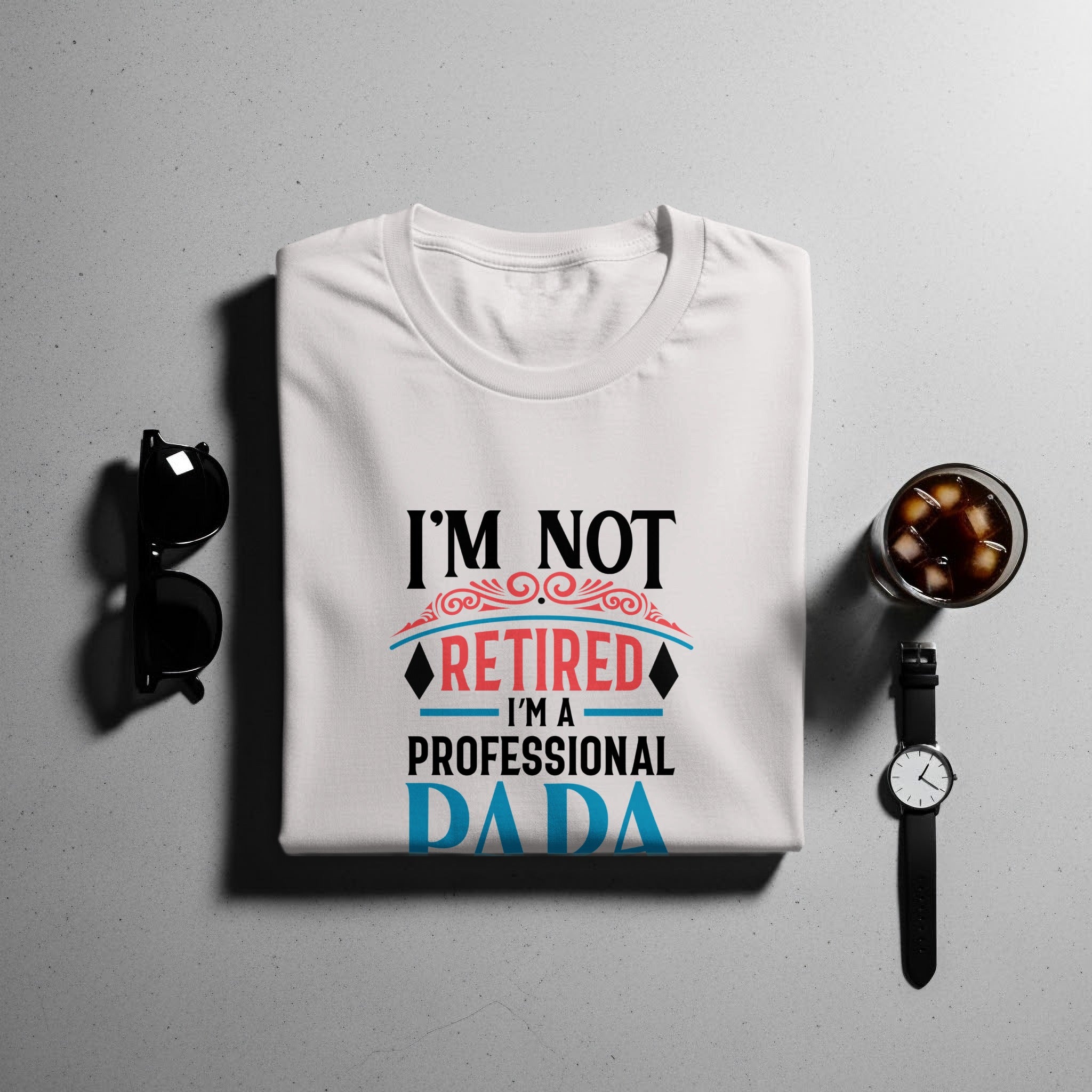 White t-shirt with "I'm not retired, I'm a professional DADA" text.