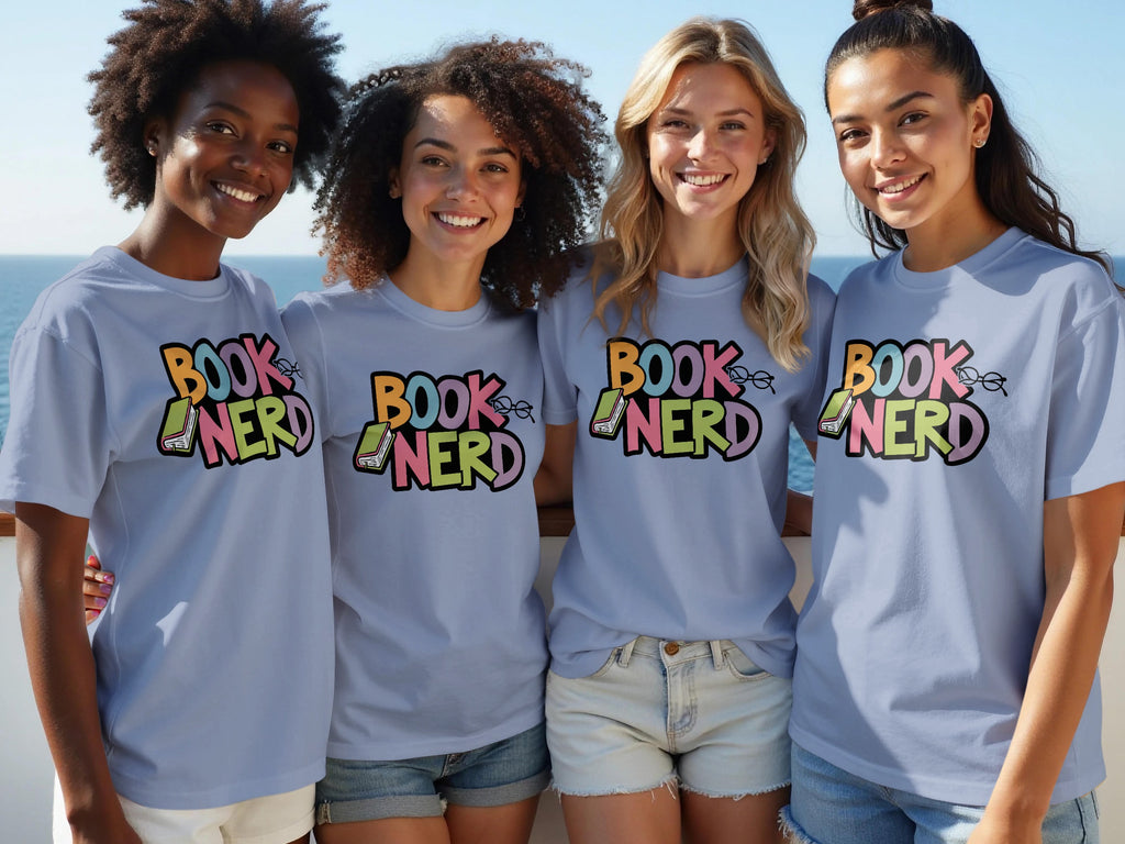 Four women wearing light blue t-shirts with "BOOK NERD" graphic and book illustration.