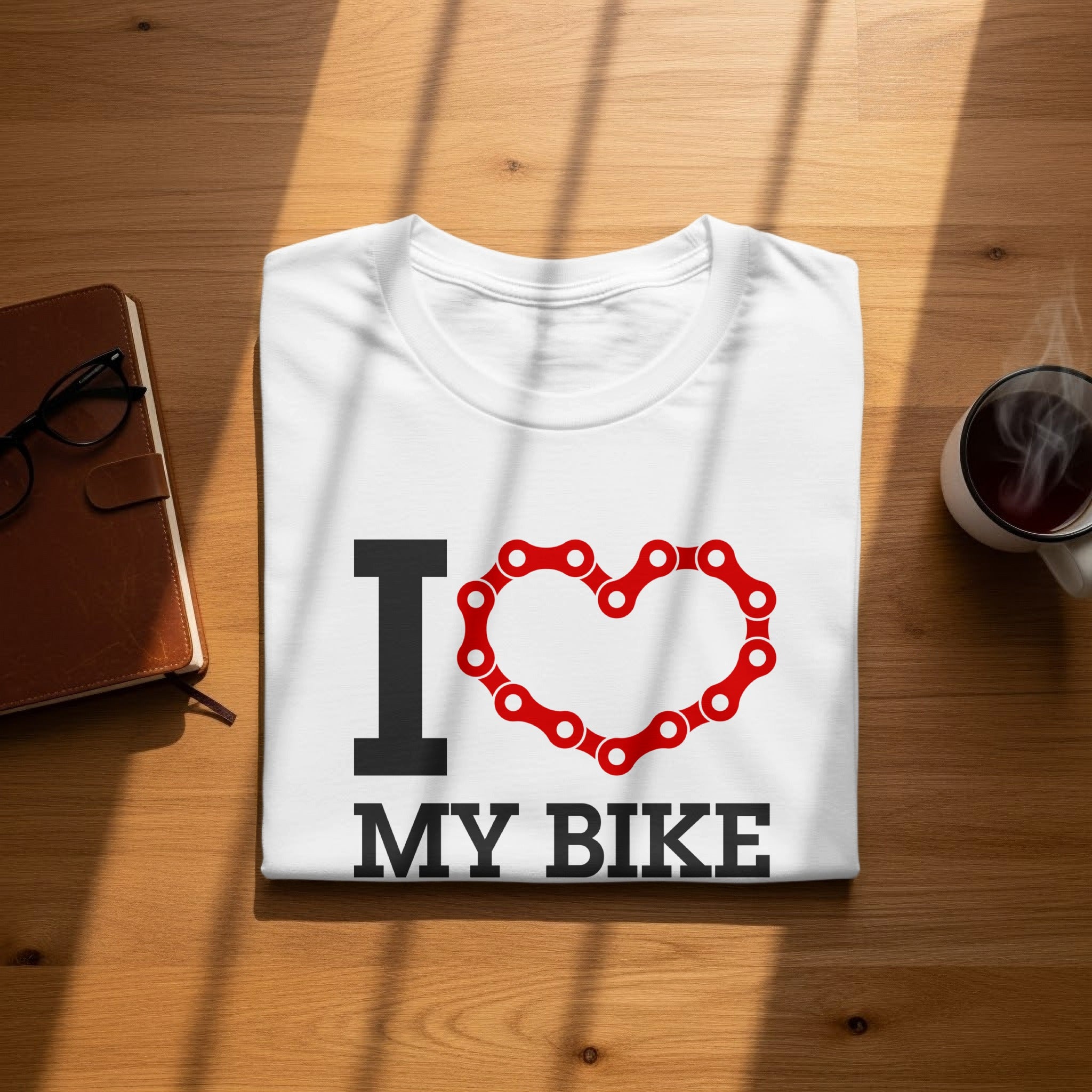 White t-shirt with "I ❤️ MY BIKE" text and a bike chain heart graphic.
