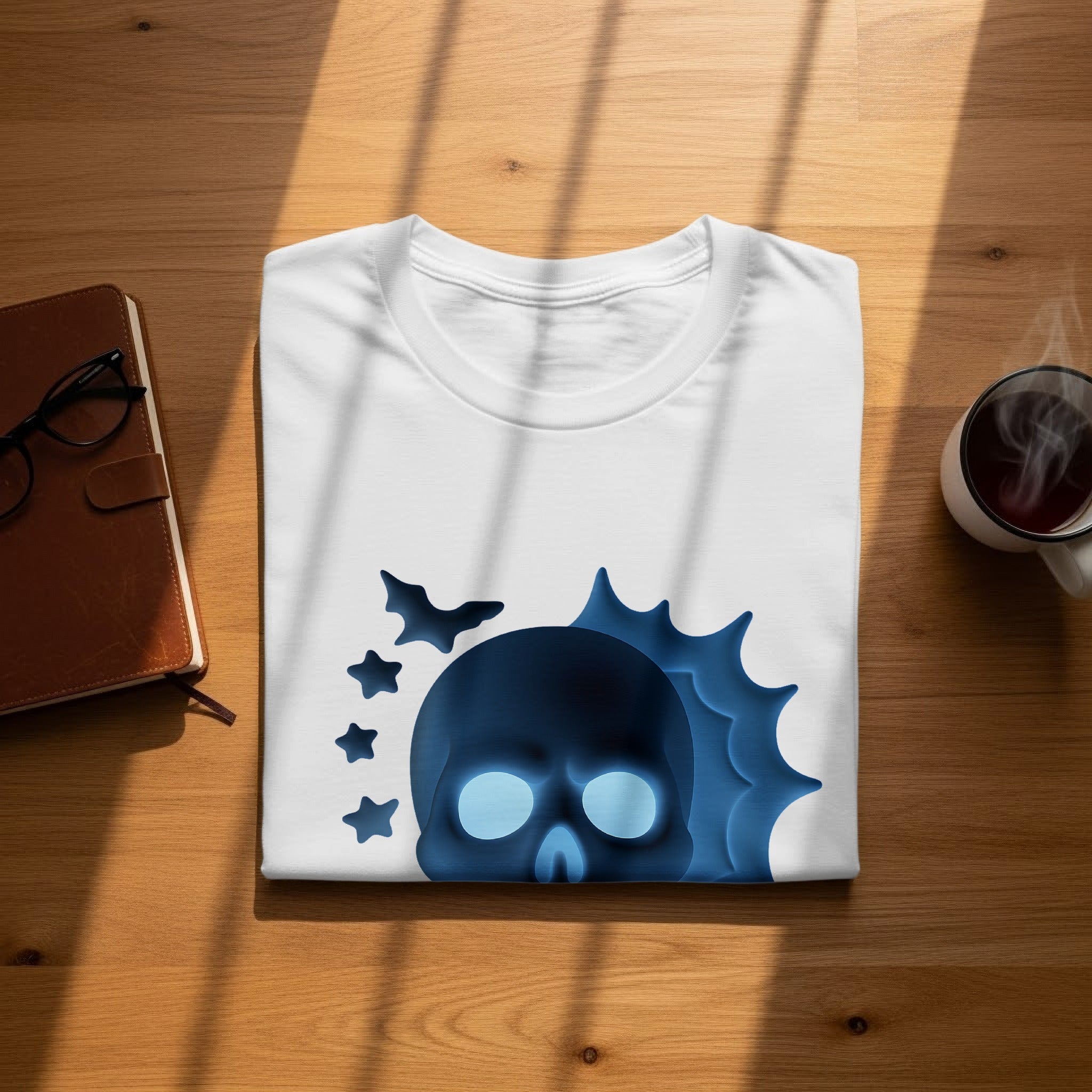 White t-shirt with blue glowing skull and bats graphic design.