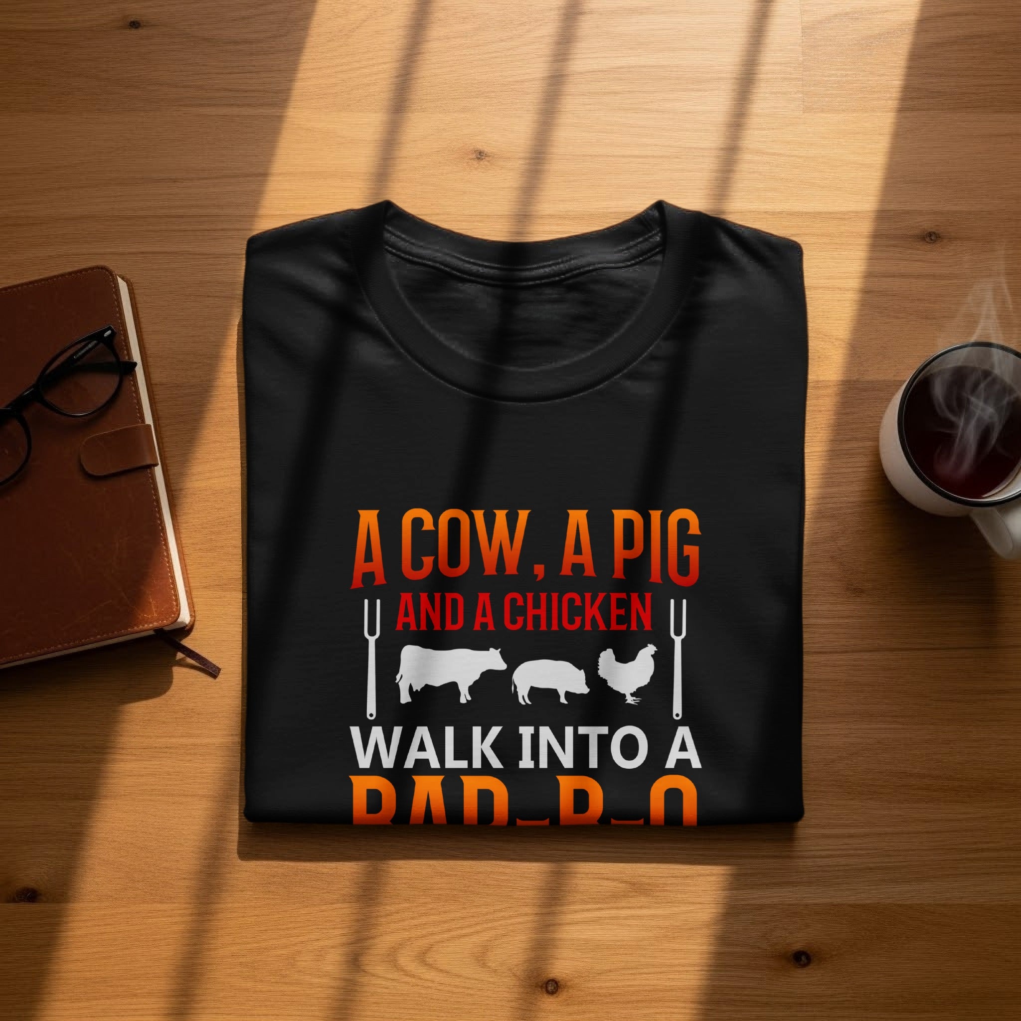 Black T-shirt design with text "A COW, A PIG AND A CHICKEN WALK INTO A DAD..." and farm animal graphics.