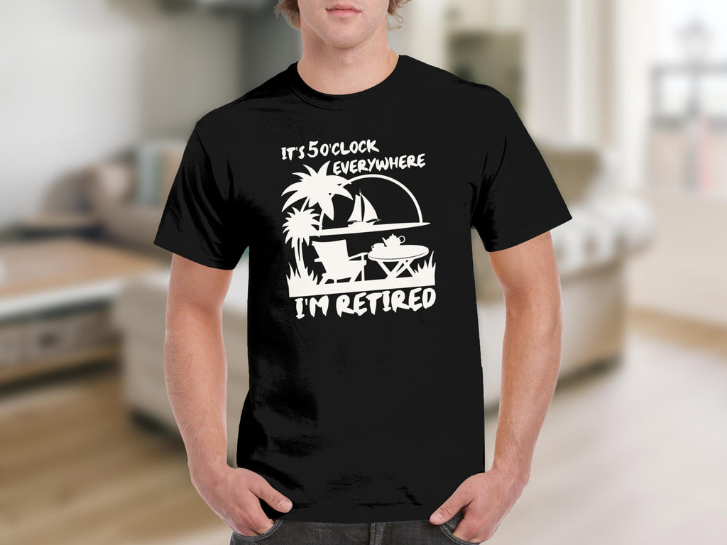 Black t-shirt with white graphic: "It's 5 o'clock everywhere, I'm retired."