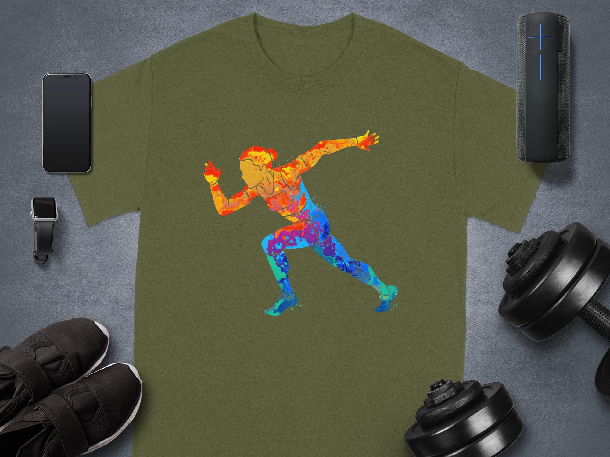 Olive green t-shirt with a multi-colored running figure graphic.