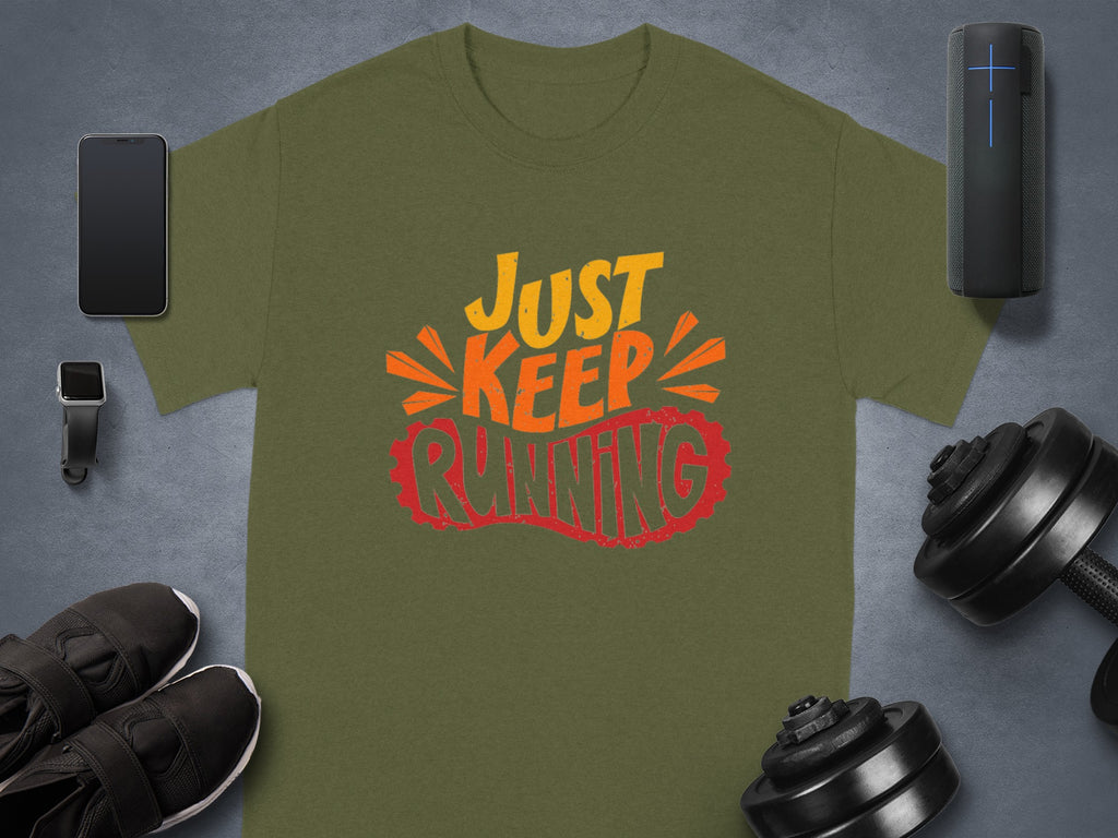 Olive green t-shirt with "JUST KEEP RUNNING" in colorful text with athletic gear.