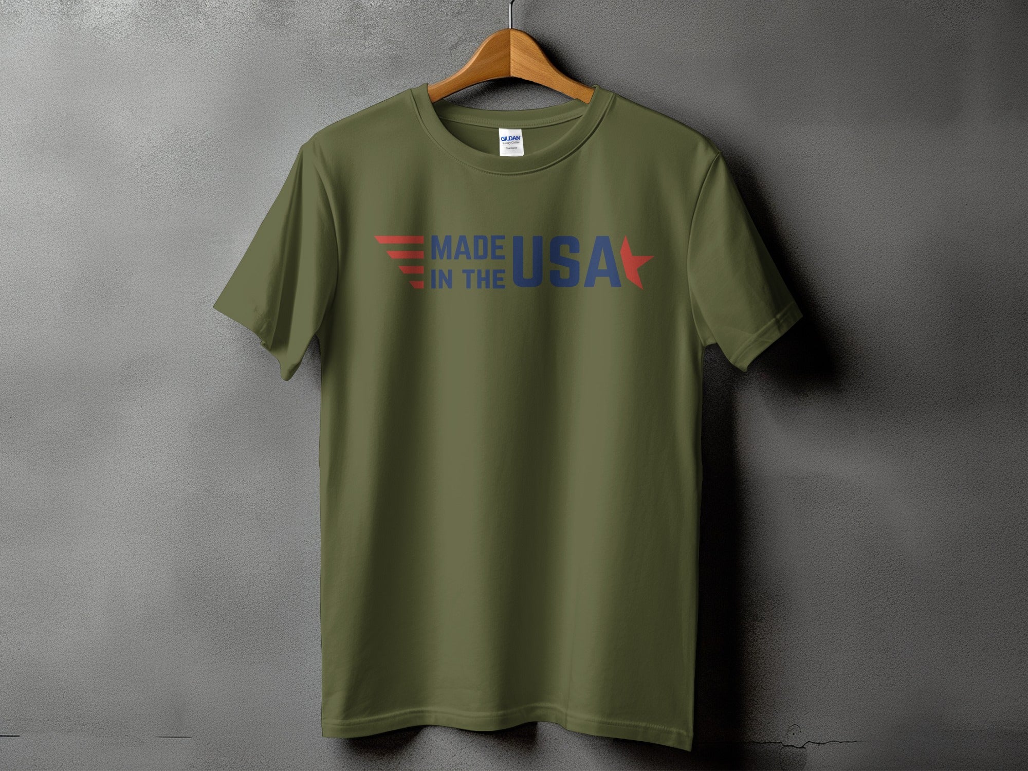 Olive green t-shirt with "MADE IN THE USA" text in red and blue.