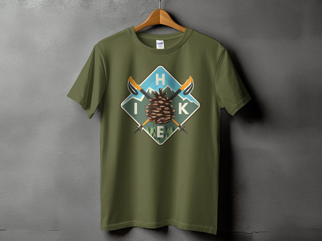 Green t-shirt with diamond graphic featuring pinecone, mountains, and the word "HIKE".