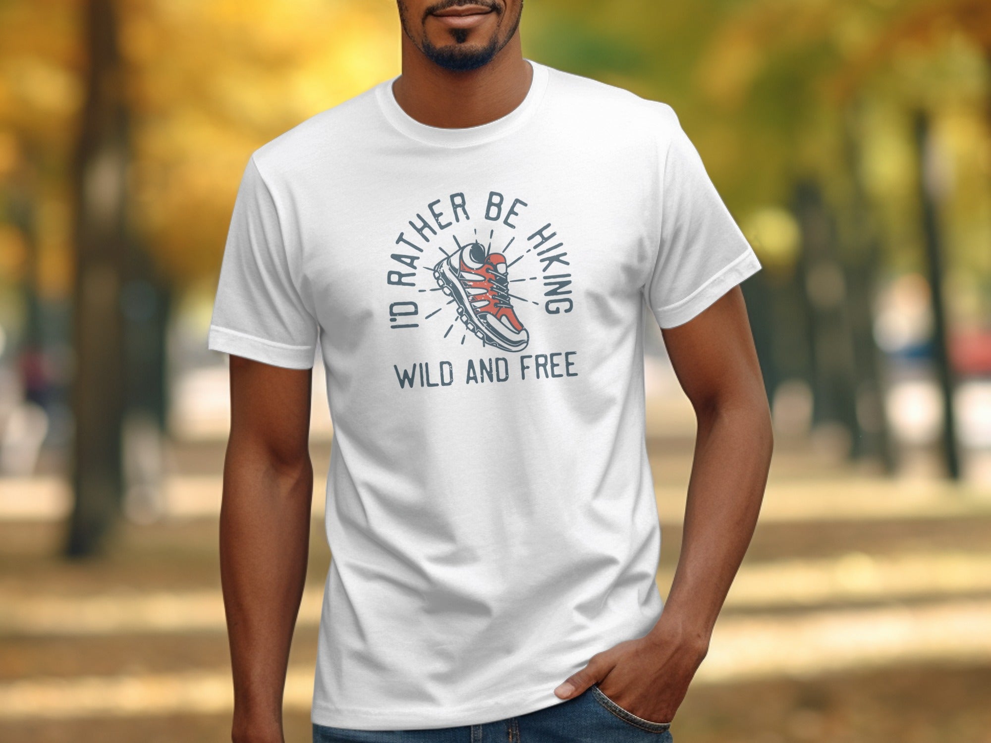 White t-shirt with graphic "I'd rather be hiking wild and free" and a shoe.