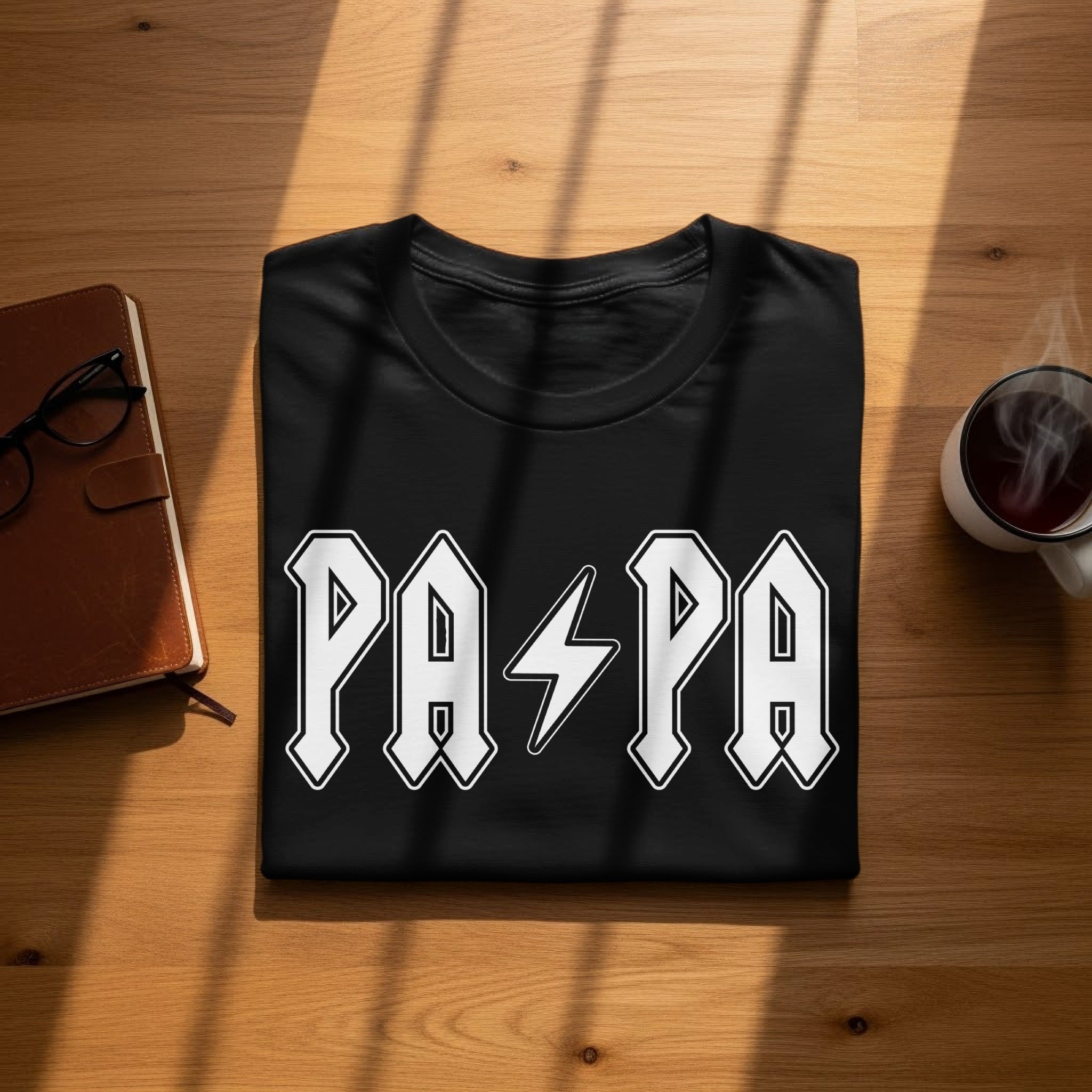 Black t-shirt with "PAPA" in white lettering and a lightning bolt.