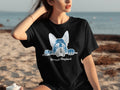 Black t-shirt with a blue German Shepherd graphic and text below.