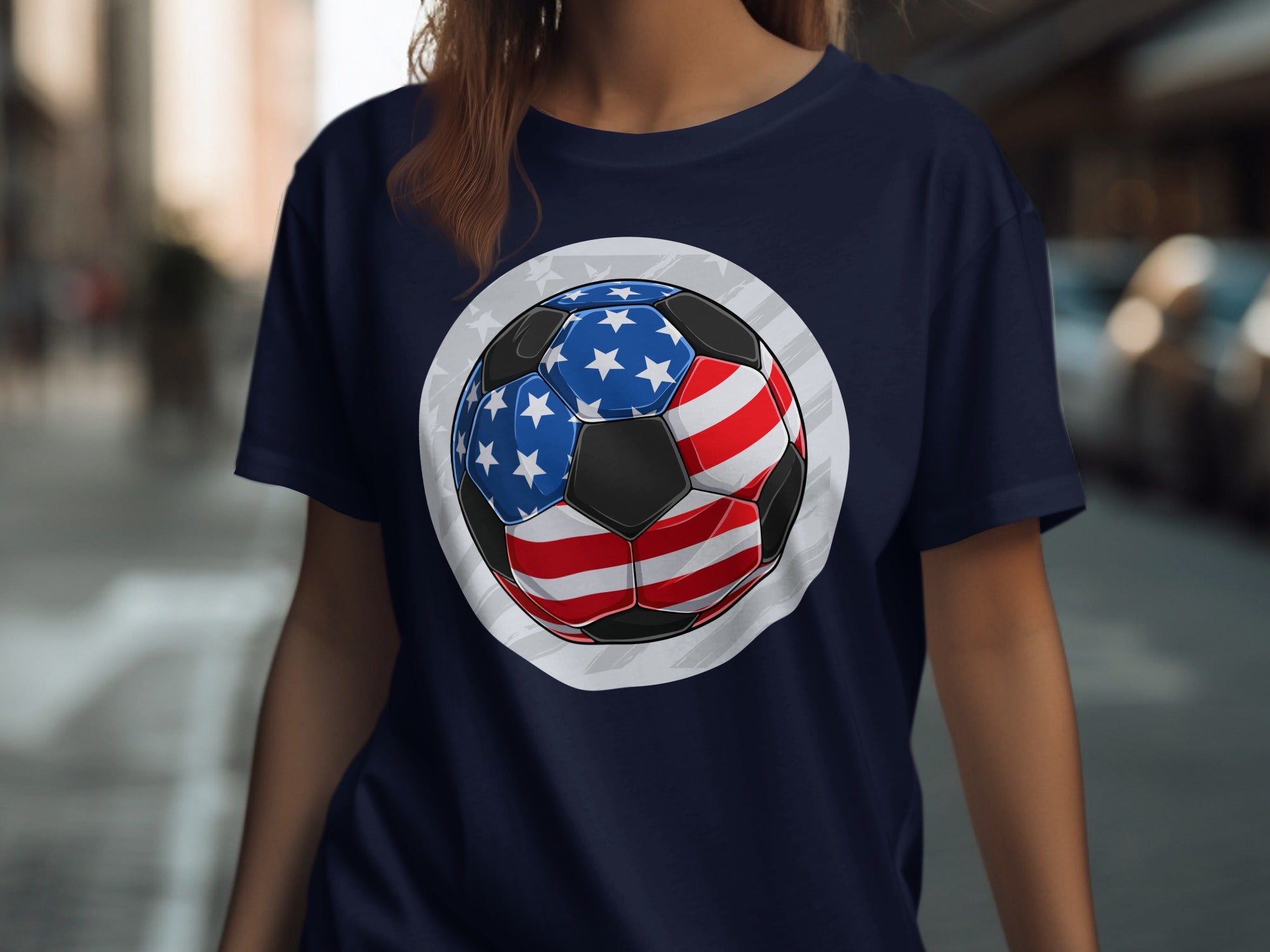 Navy t-shirt with a soccer ball designed with American flag patterns.