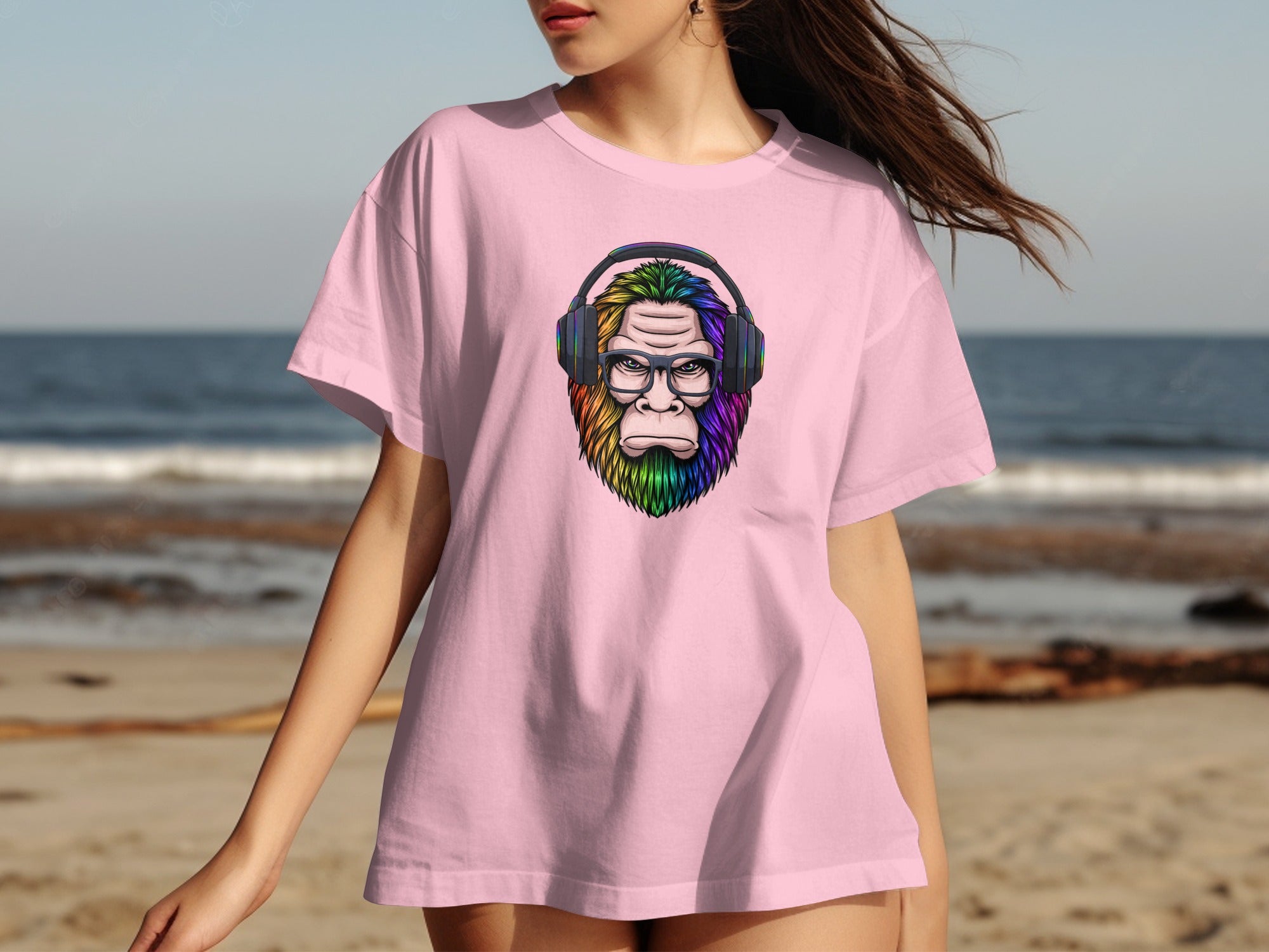 Pink t-shirt with a soulful, rainbow-maned ape wearing headphones and glasses.