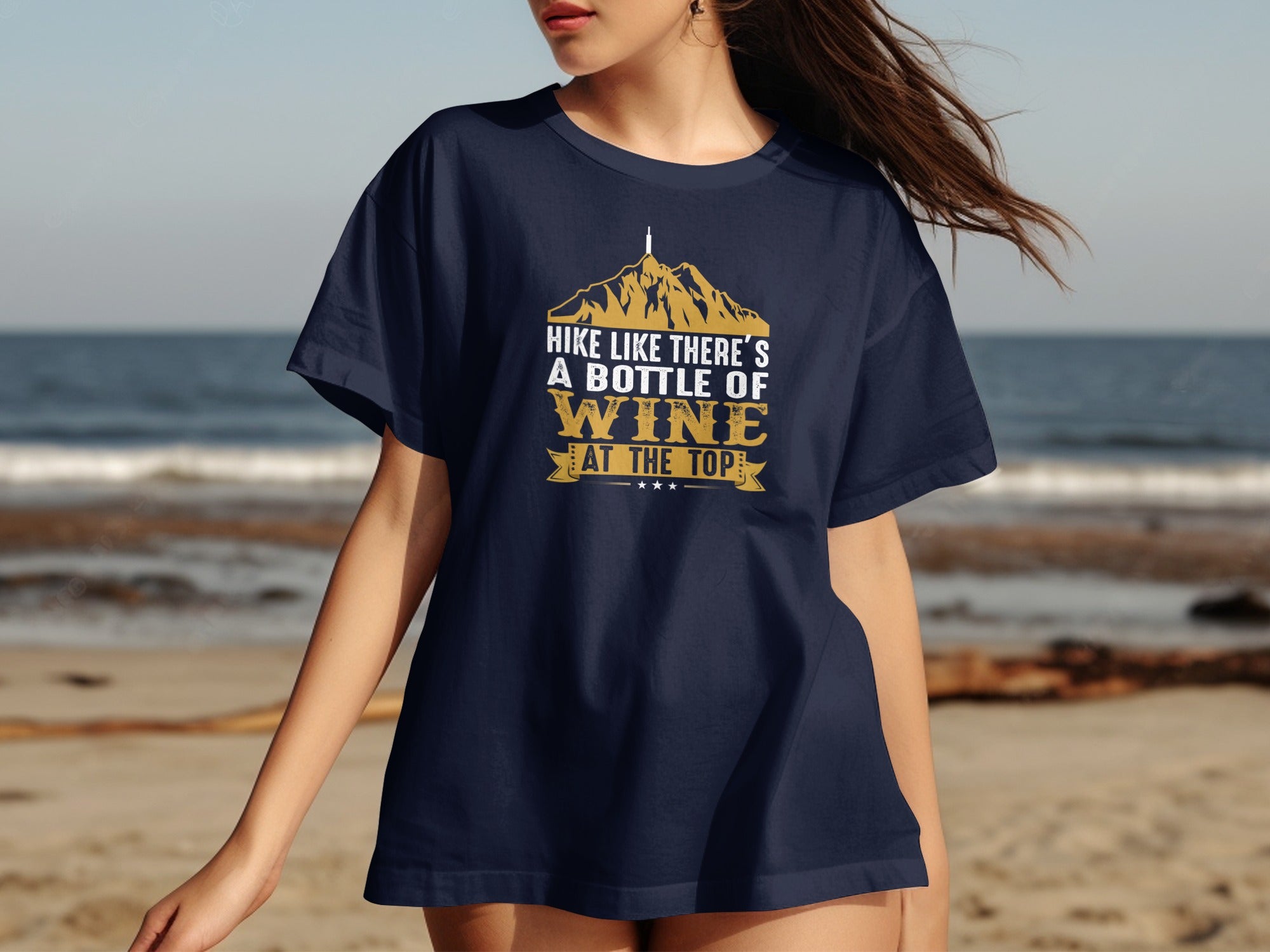 Navy t-shirt with mountains and text: Hike like there's a bottle of wine at the top.