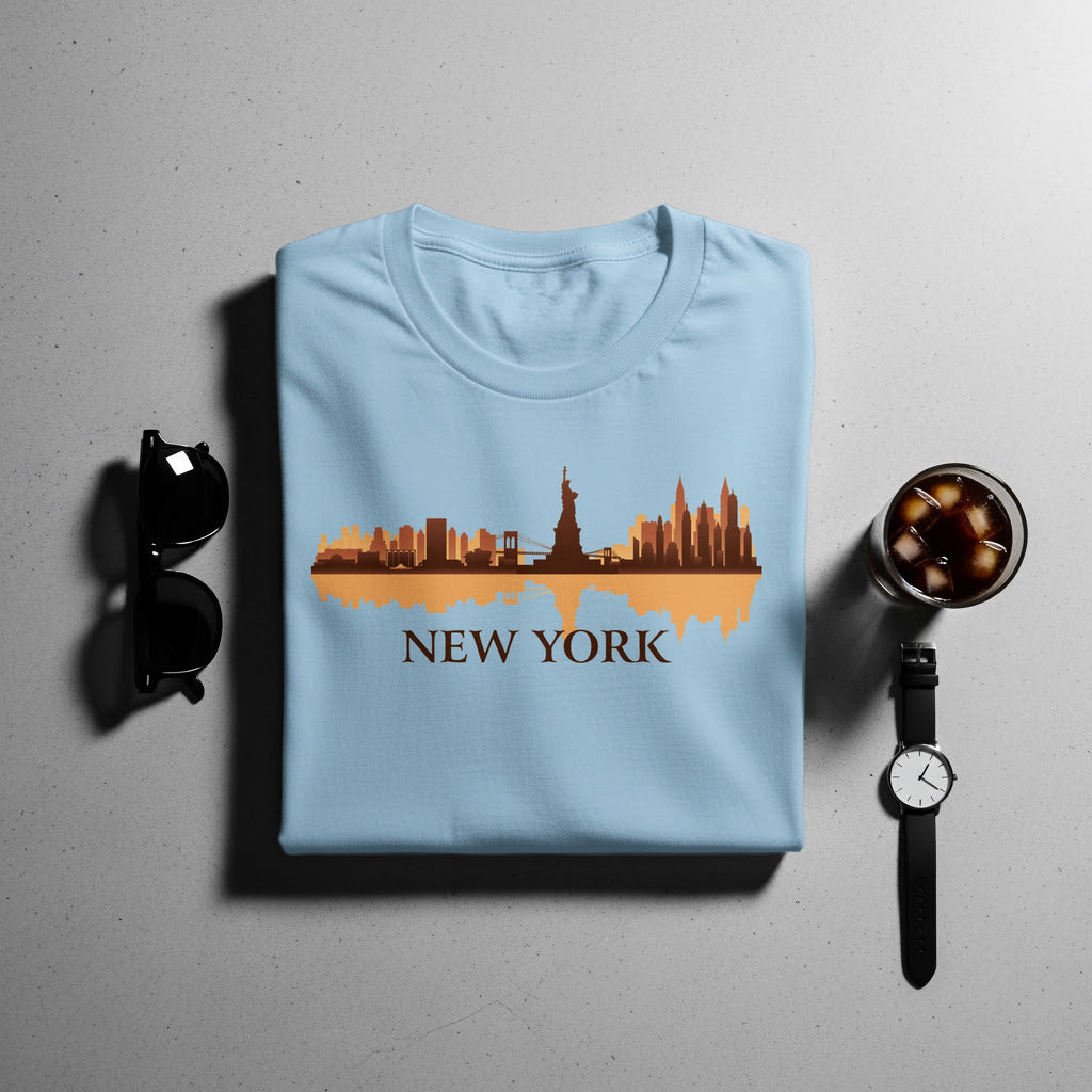 Light blue t-shirt with a New York City skyline graphic and text.