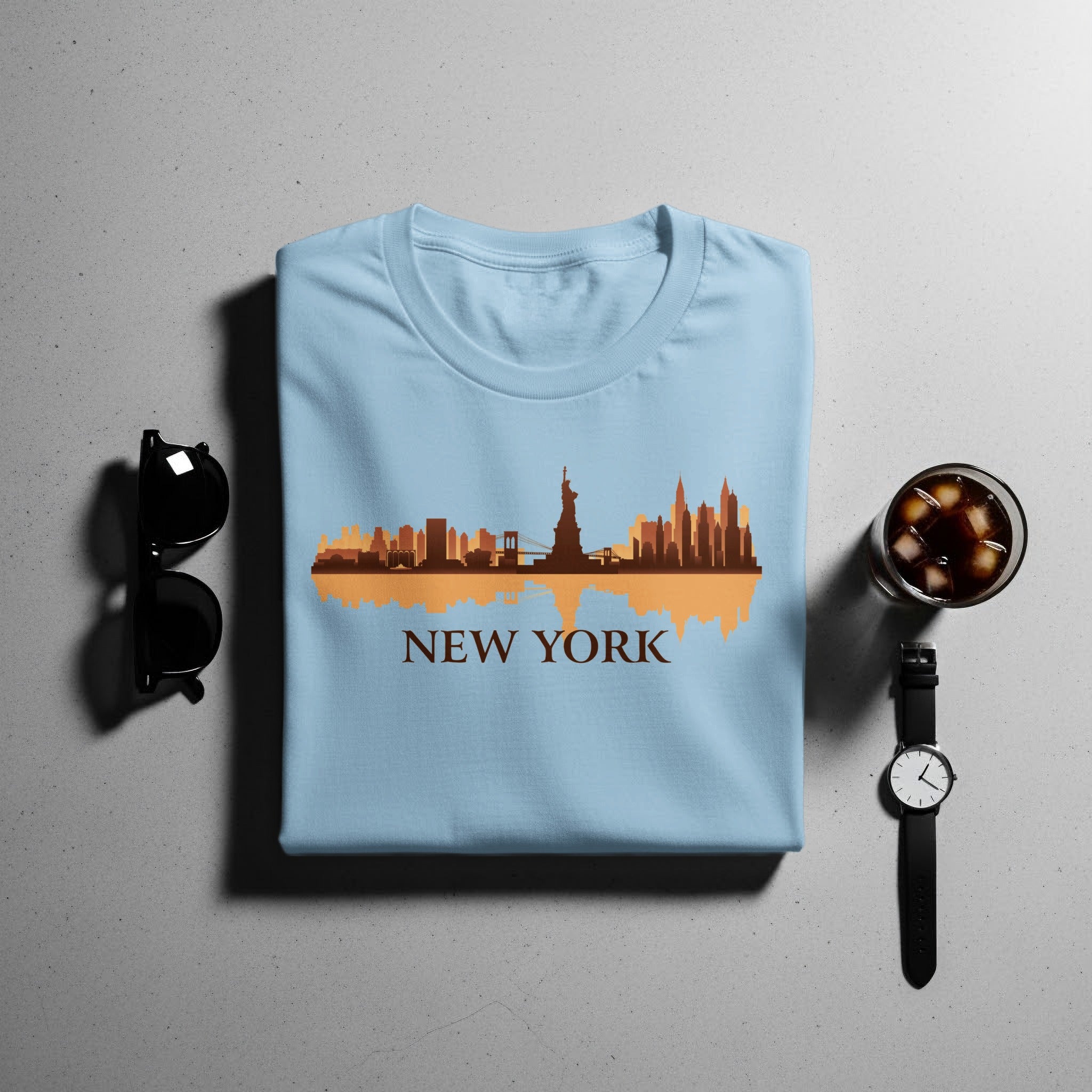 Light blue t-shirt with a New York City skyline graphic and text.