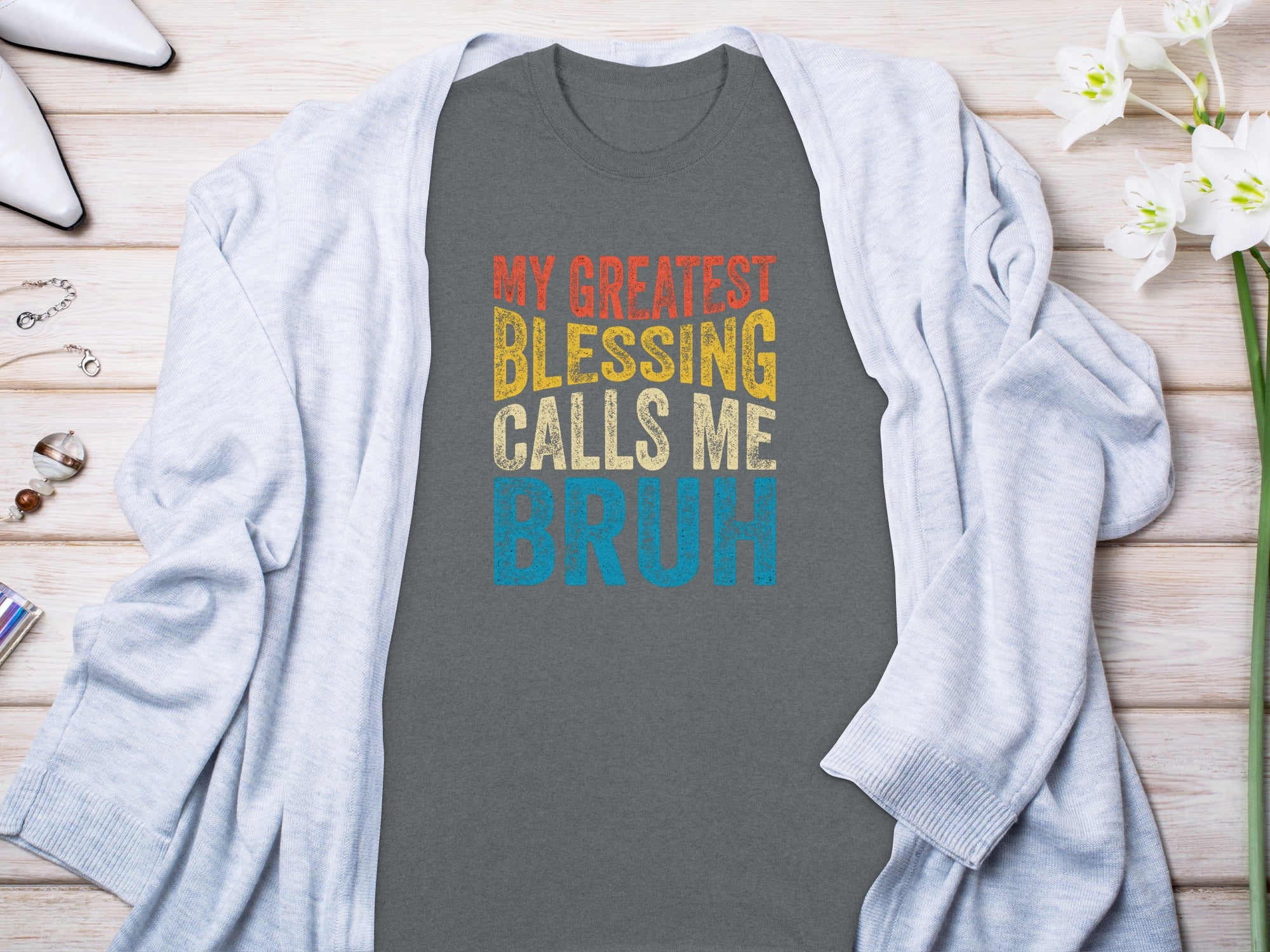 Dark grey t-shirt with "MY GREATEST BLESSING CALLS ME BRUH" text.