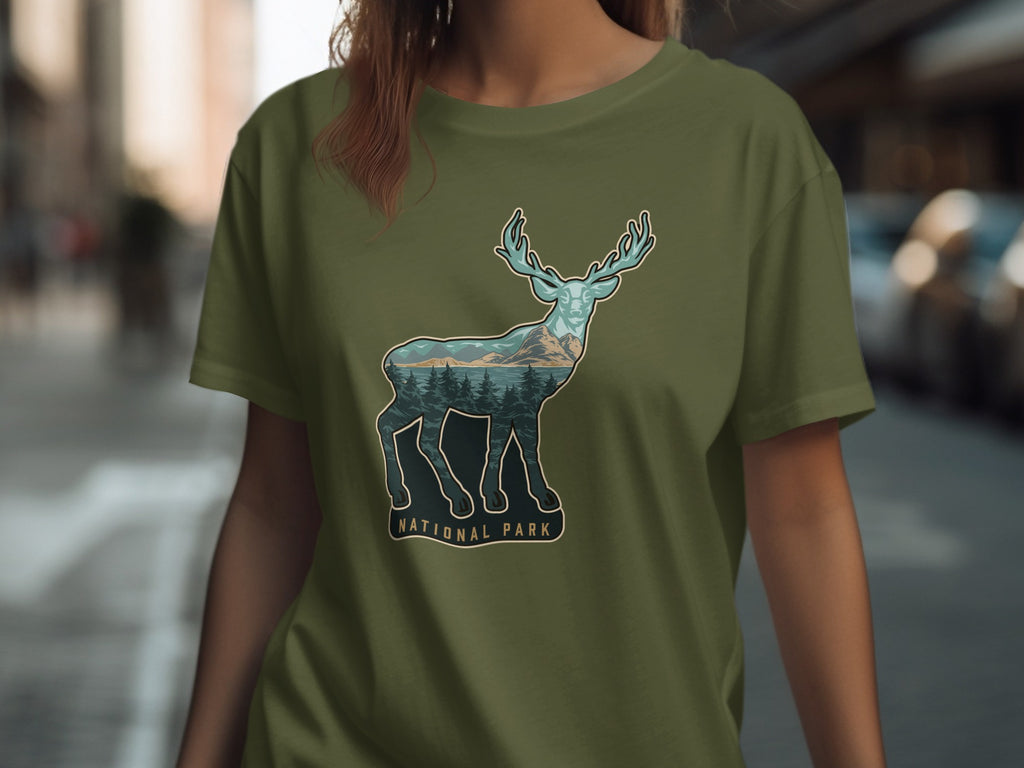 T-shirt with deer illustration featuring mountain and forest scene, "National Park" text.