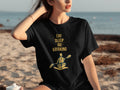 Black t-shirt with "Eat Sleep Go Kayaking" text and kayaking graphic.