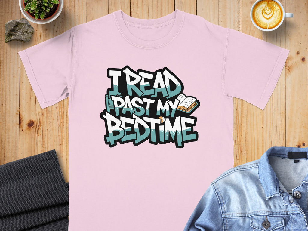 Pink t-shirt with "I READ PAST MY BEDTIME" text and book graphic.