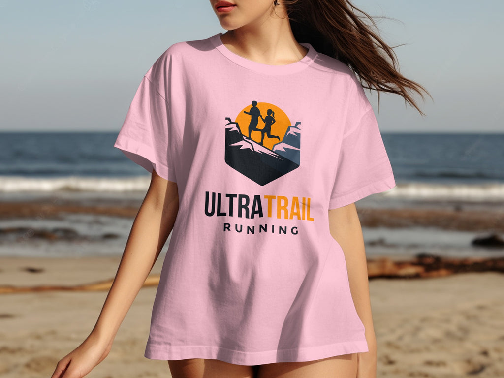 Pink t-shirt with "ULTRA TRAIL RUNNING" logo featuring running silhouettes.