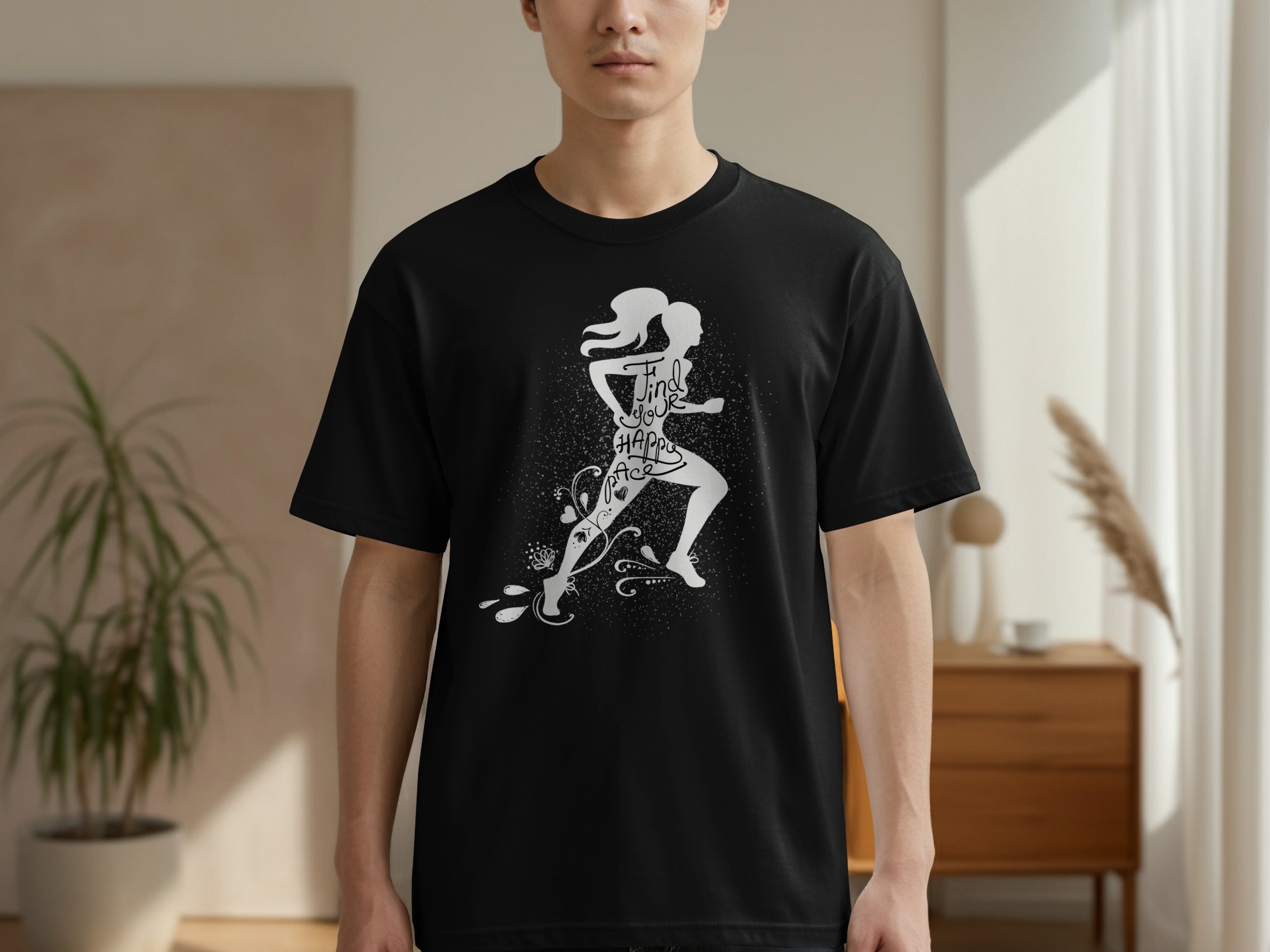 Black t-shirt with a white graphic of a runner and the text "Find your happy pace."