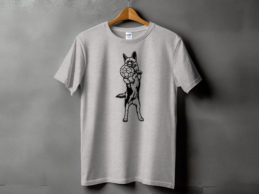 Light gray t-shirt with black graphic of a German Shepherd holding a soccer ball.