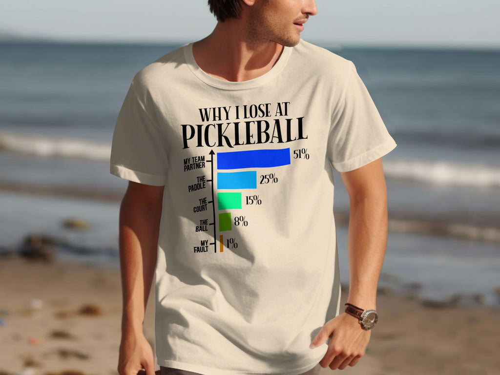 T-shirt with "Why I Lose at Pickleball" graphic and a bar chart.