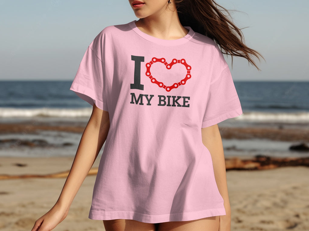 Pink t-shirt with "I ❤️ MY BIKE" text and bicycle chain heart graphic.