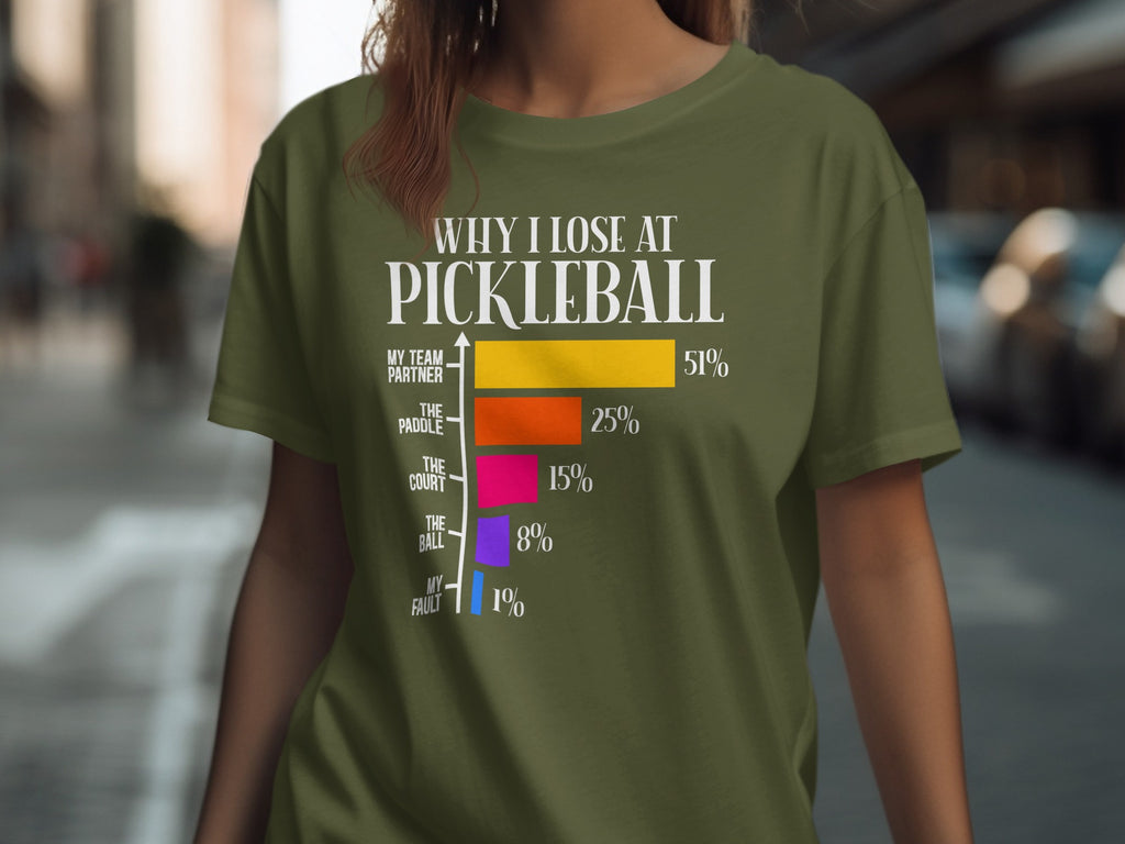 T-shirt with "Why I Lose at Pickleball" graphic and bar chart.