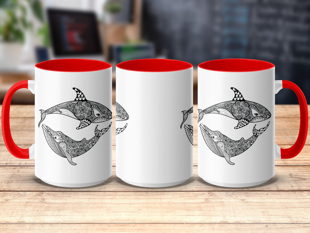 White mugs with red handles featuring black orca and whale mandala designs.